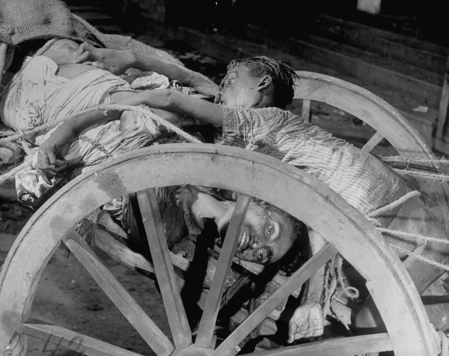 Corpses in a cart prior to being cremated after bloody rioting between Hindus and Muslims, Calcutta (now Kolkata), India, 1946.