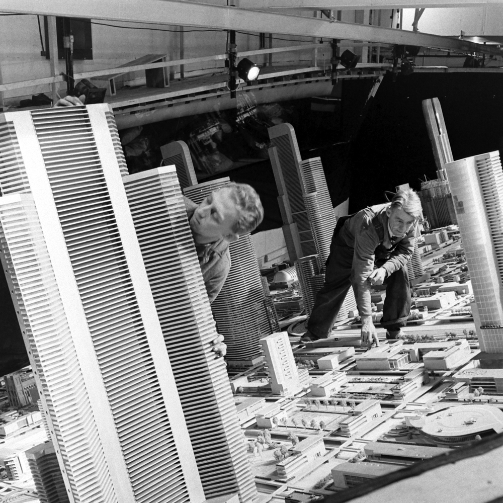 Craftsmen work on a huge architectural model of "the city of the future" at the 1939 World's Fair.