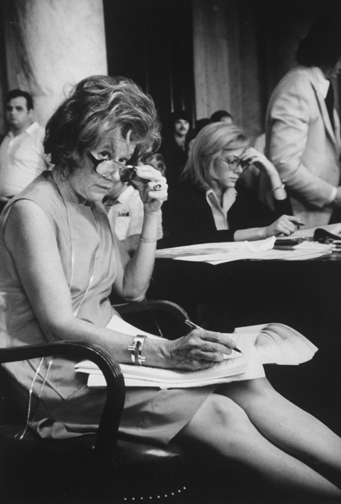 Reporter Mary McGrory (left) working with CBS News correspondent Lesley Stahl (right) and others during the Senate Watergate hearings, 1973.