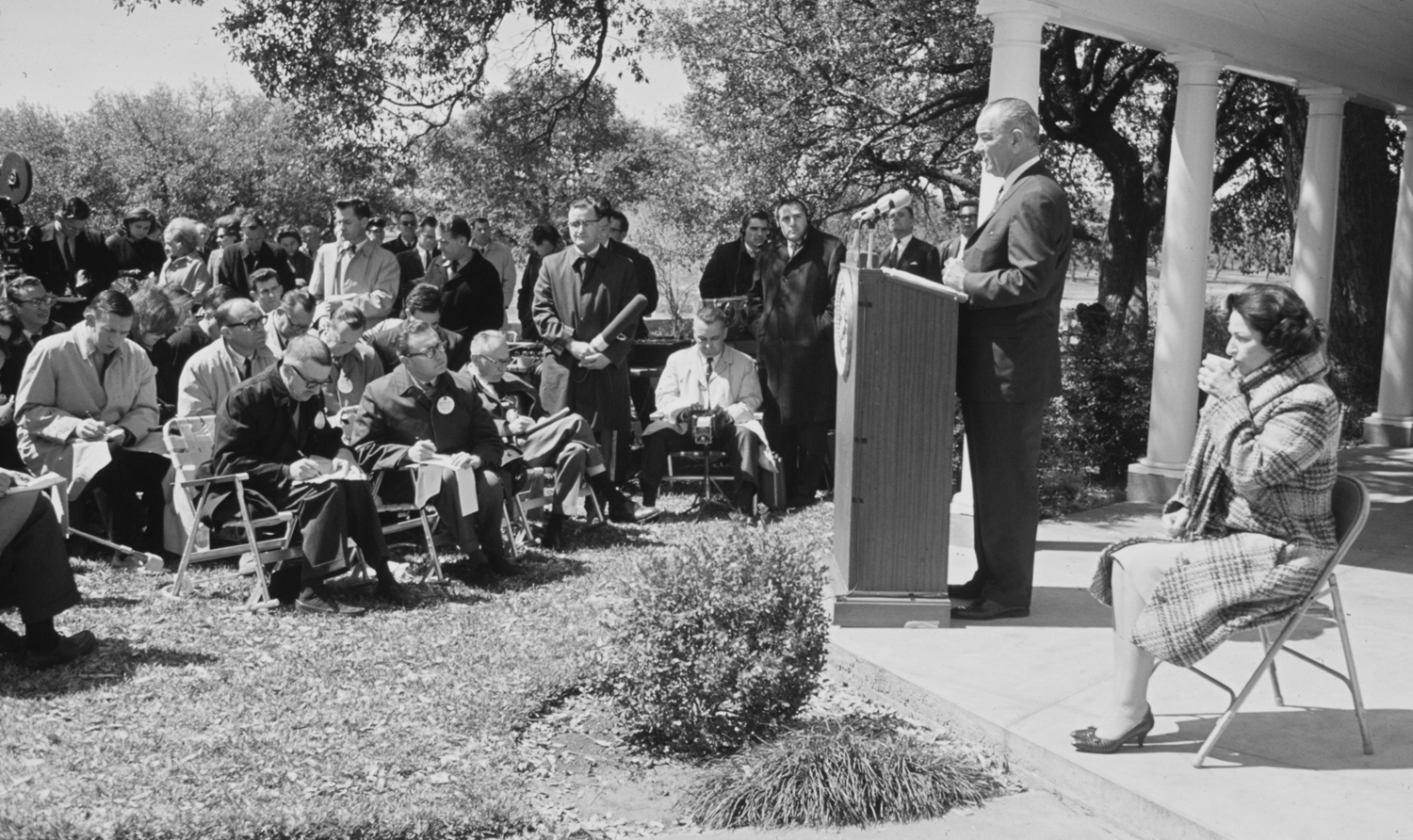 President Lyndon Johnson talks to the press at his ranch in Texas, 1965.