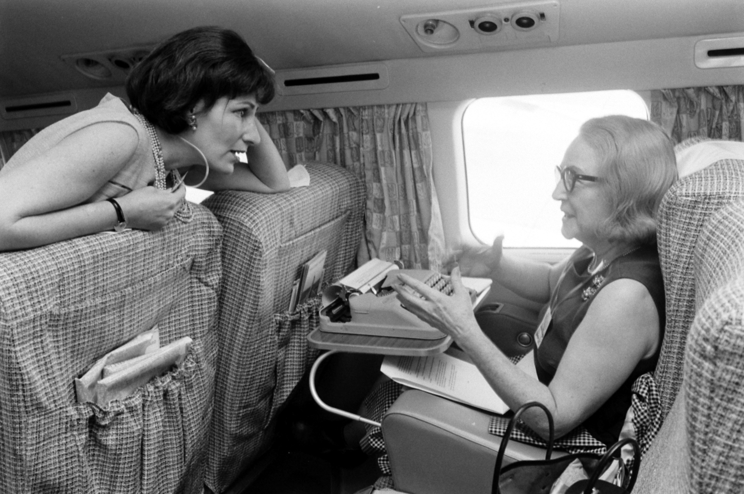 Reporters on a plane with Lady Bird Johnson, mid-1960s.