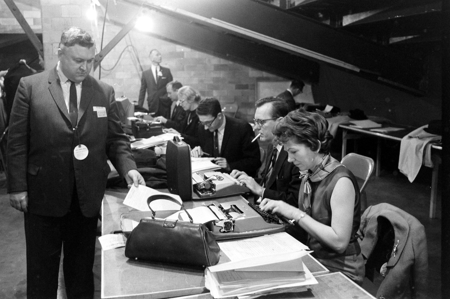 Reporters in the bowels of the University of Kentucky's Memorial Coliseum during the school's Founders Day Convocation, at which President Johnson spoke, Feb. 1965.