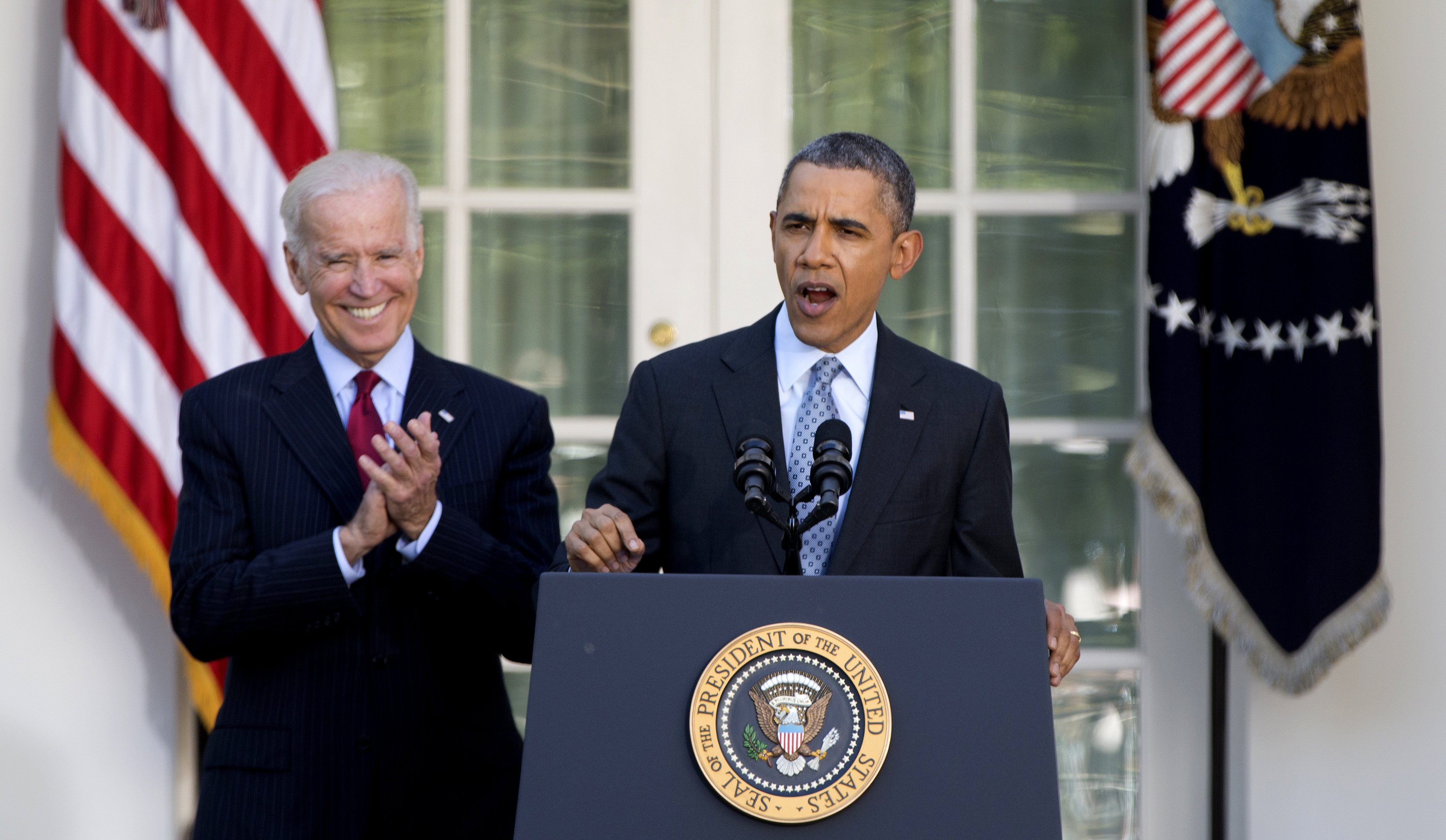President Barack Obama, with Vice President Joe Biden, speaks in the Rose Garden of the White House in Washington, Tuesday, April 1, 2014, about the Affordable Care Act. (Carolyn Kaster—AP)