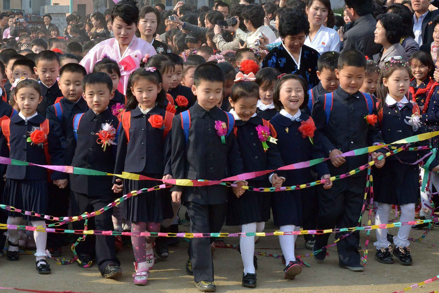 New first-year pupils attend a primary school in Pyongyang on April 1, 2014. The duration of primary school education was extended from four years to five in North Korea the same day, Pyongyang's official Korean Central News Agency reported.