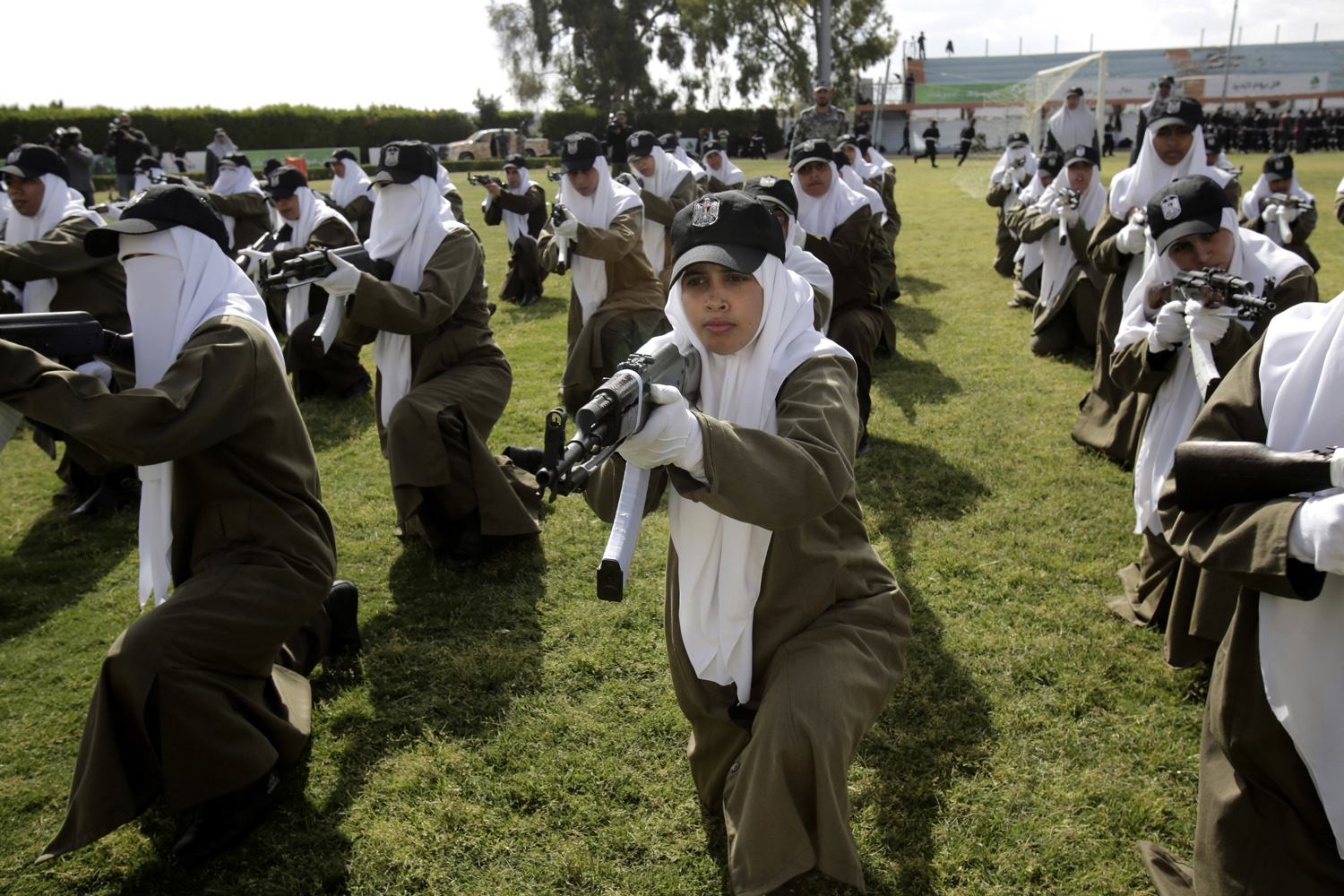 Apr. 2, 2014. Palestinian female Hamas security officers demonstrate their skills during a graduation ceremony in the northern Gaza Strip. 1200 officers graduated from advanced training courses that lasted one year in Gaza police academy of Hamas.