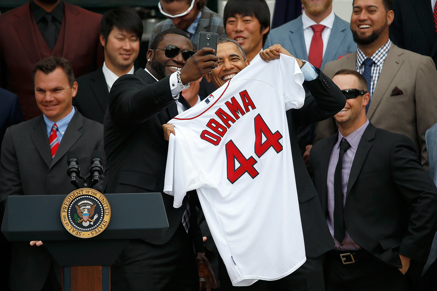 Apr. 1, 2014. Boston Red Sox designated hitter David Ortiz (3rd L) poses for a  selfie  with U.S. President Barack Obama during a ceremony on the South Lawn of the White House to honor the 2013 World Series Champion Boston Red Sox in Washington, DC.
