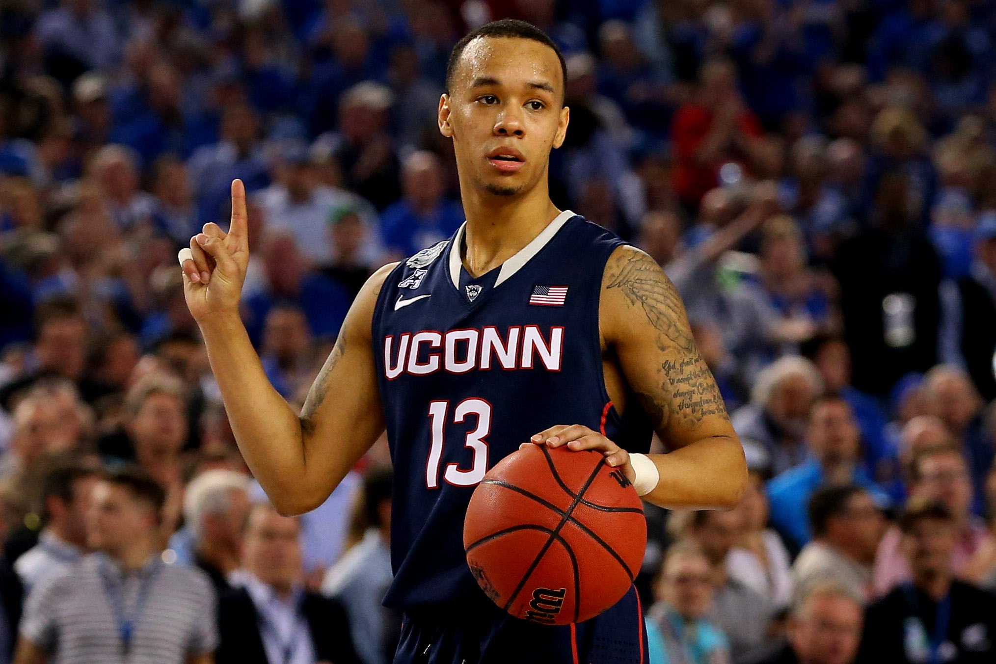 Shabazz Napier of the Connecticut Huskies reacts during the NCAA Men's Final Four Semifinal against the Florida Gators at AT&amp;T Stadium on April 5, 2014 in Arlington, Texas. (Ronald Martinez&mdash;Getty Images)