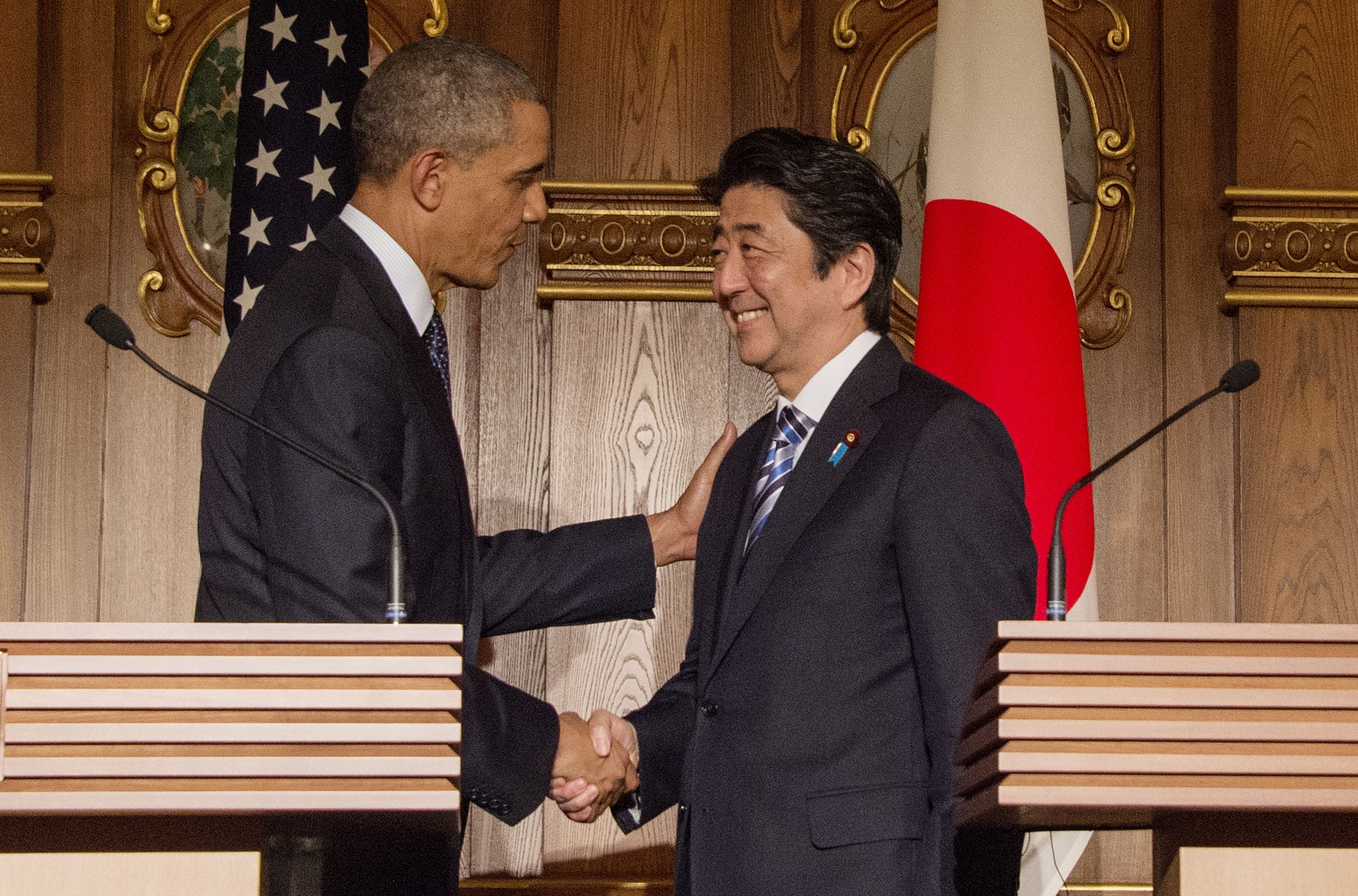 President Barack Obama shakes hands with Japanese Prime Minister Shinzo Abe following a bilateral press conference at the Akasaka Palace in Tokyo on April 24, 2014 (Jim Watson—AFP/Getty Images)