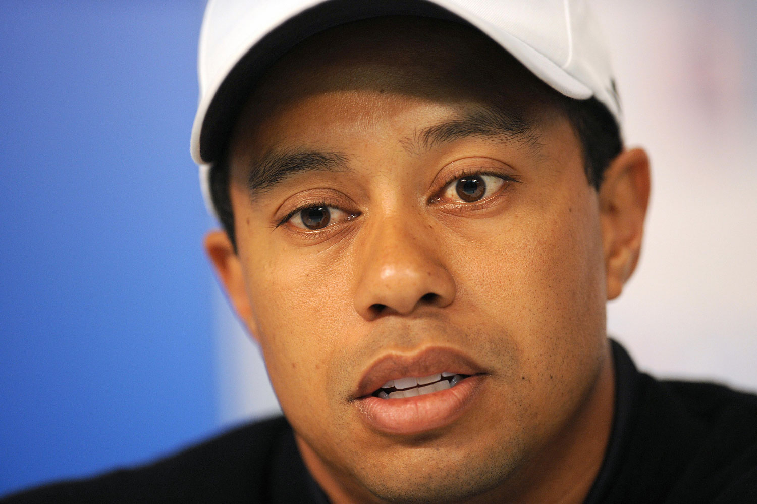 World number one golf player Tiger Woods speaks at a press conference at the Chevron World Challenge, at the Sherwood Country Cub in Thousand Oaks, Calif. on Dec. 17, 2008.
