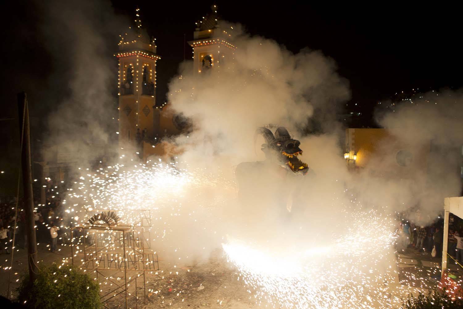 Apr. 20, 2014. An effigy of Judas is engulfed in fireworks, in the courtyard of the Santa Rosa Xochiac church, in Mexico City, soon after midnight on Easter Sunday.