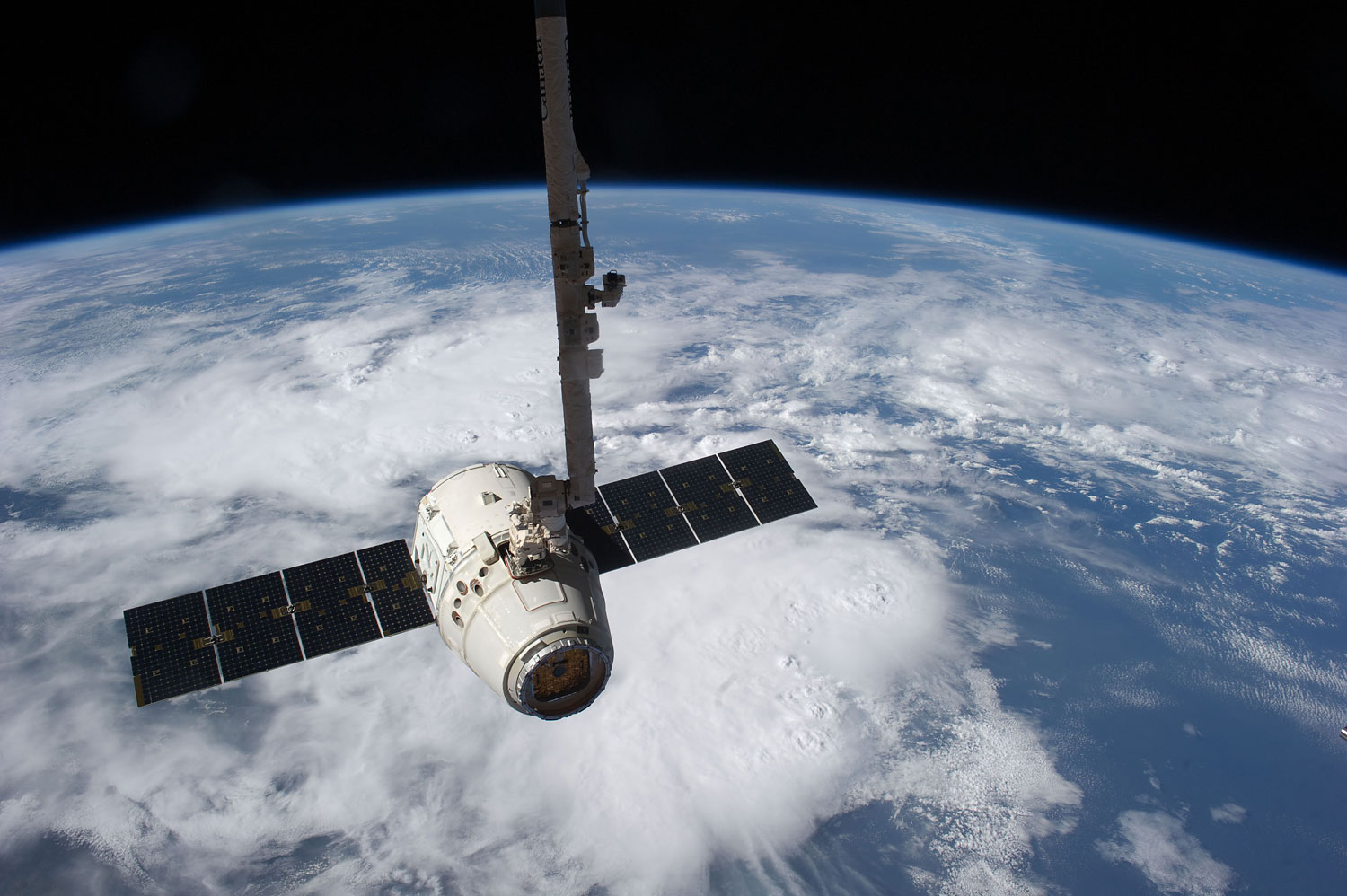 This image provided by NASA shows the SpaceX Dragon cargo craft just prior to being released by the International Space Station's robotic arm on May 31, 2012 (NASA—AP)