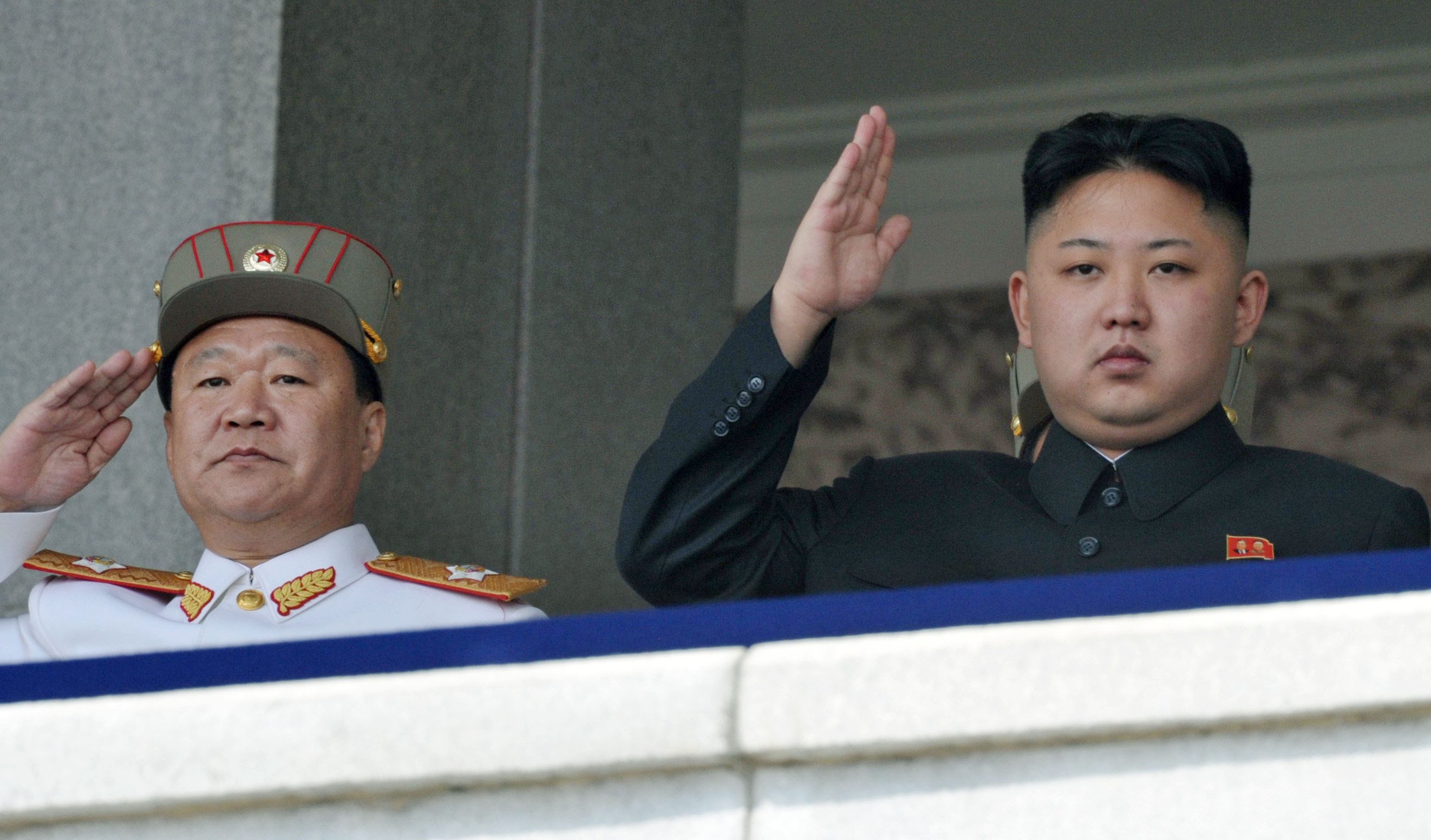 Kim Jong Un salutes during a military parade. He accused the U.S. of trying to "crush" North Korea militarily (Kyodo News—Associated Press)