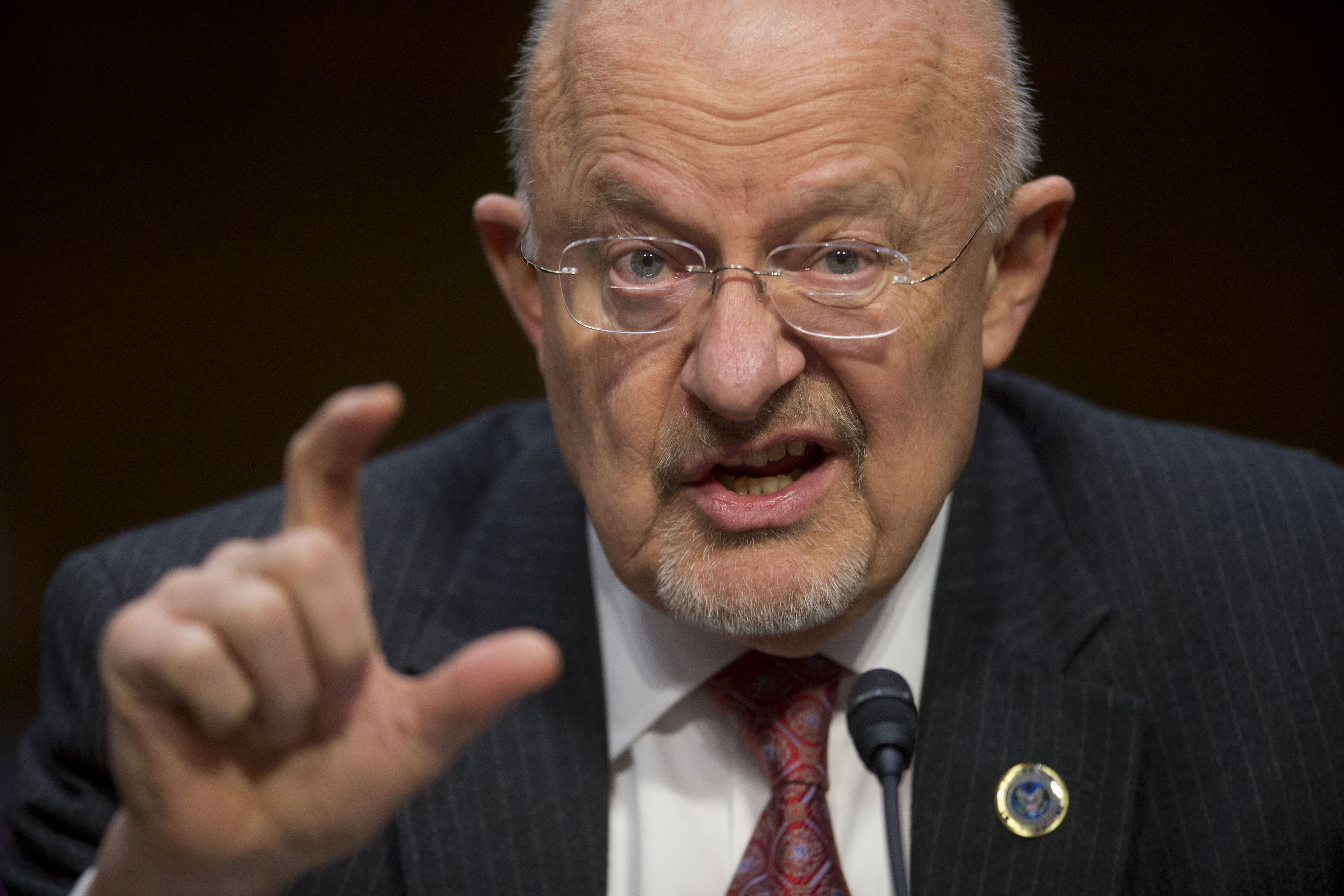Director of National Intelligence James Clapper testifies on Capitol Hill in Washington, Wednesday, Jan. 29, 2014, before the Senate Intelligence Committee hearing on current and projected national security threats against the US. (Pablo Martinez Monsivais—AP)