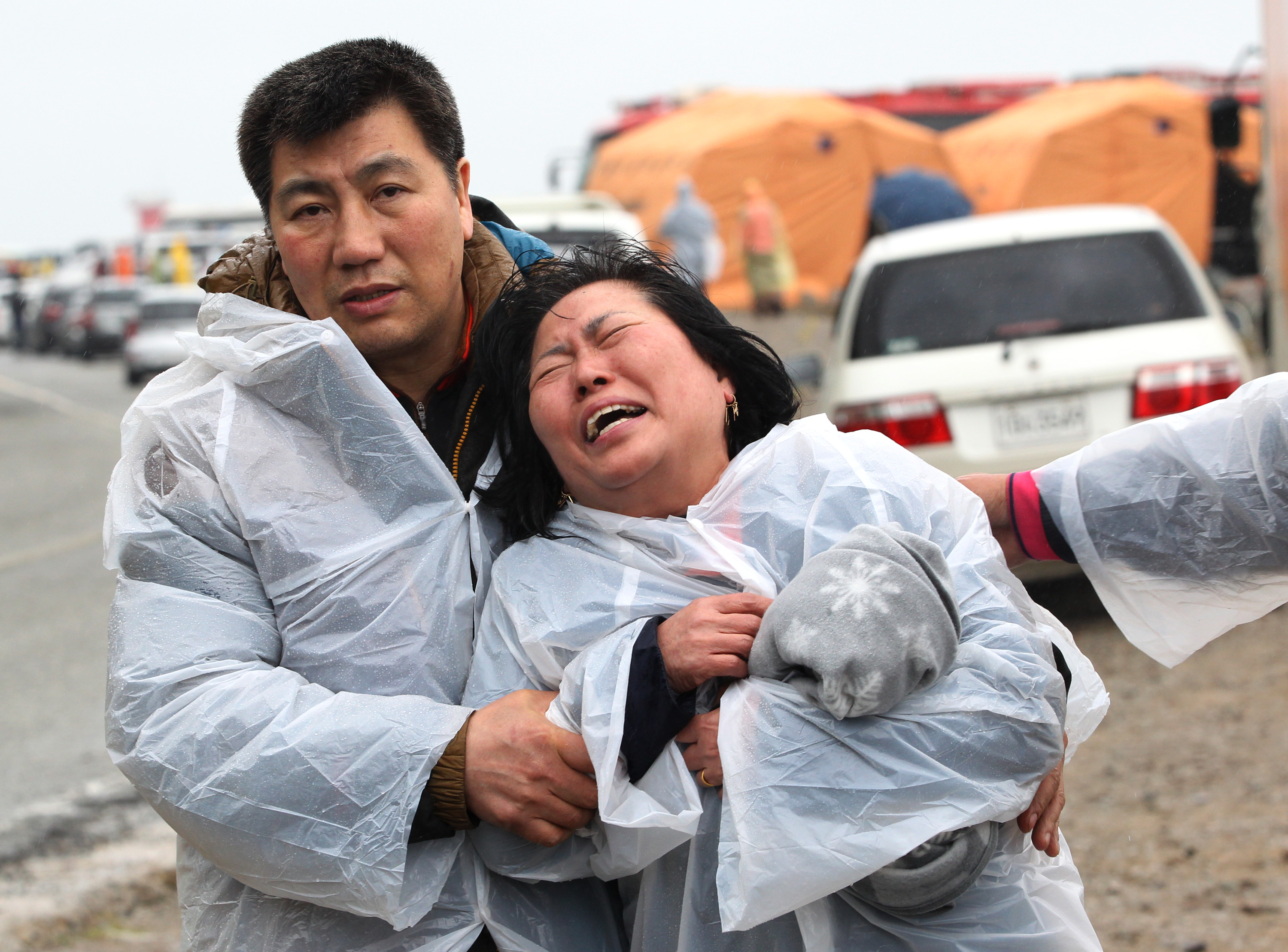 A relative of a passenger aboard a sunken ferry weeps at a port in Jindo, South Korea, April 17, 2014. (Ahn Young-joon—AP)