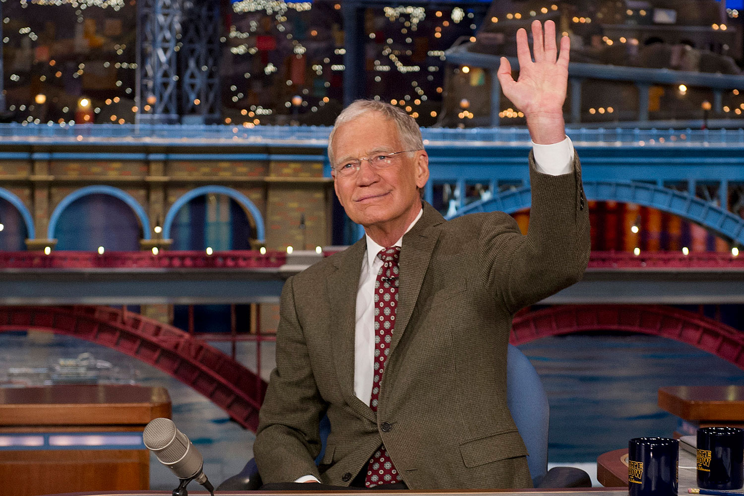 In this photo provided by CBS, David Letterman, host of the “Late Show with David Letterman,” waves to the audience in New York on Thursday, April 3, 2014, after announcing that he will retire sometime in 2015. (Jeffrey R. Staab—CBS/AP)