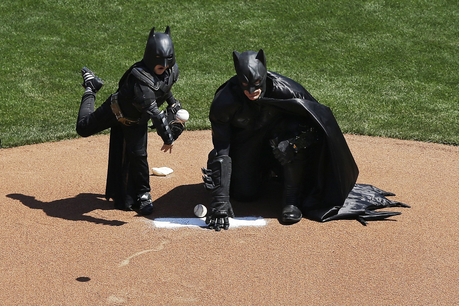 Batkid throws the opening pitch for the San Francisco Giants