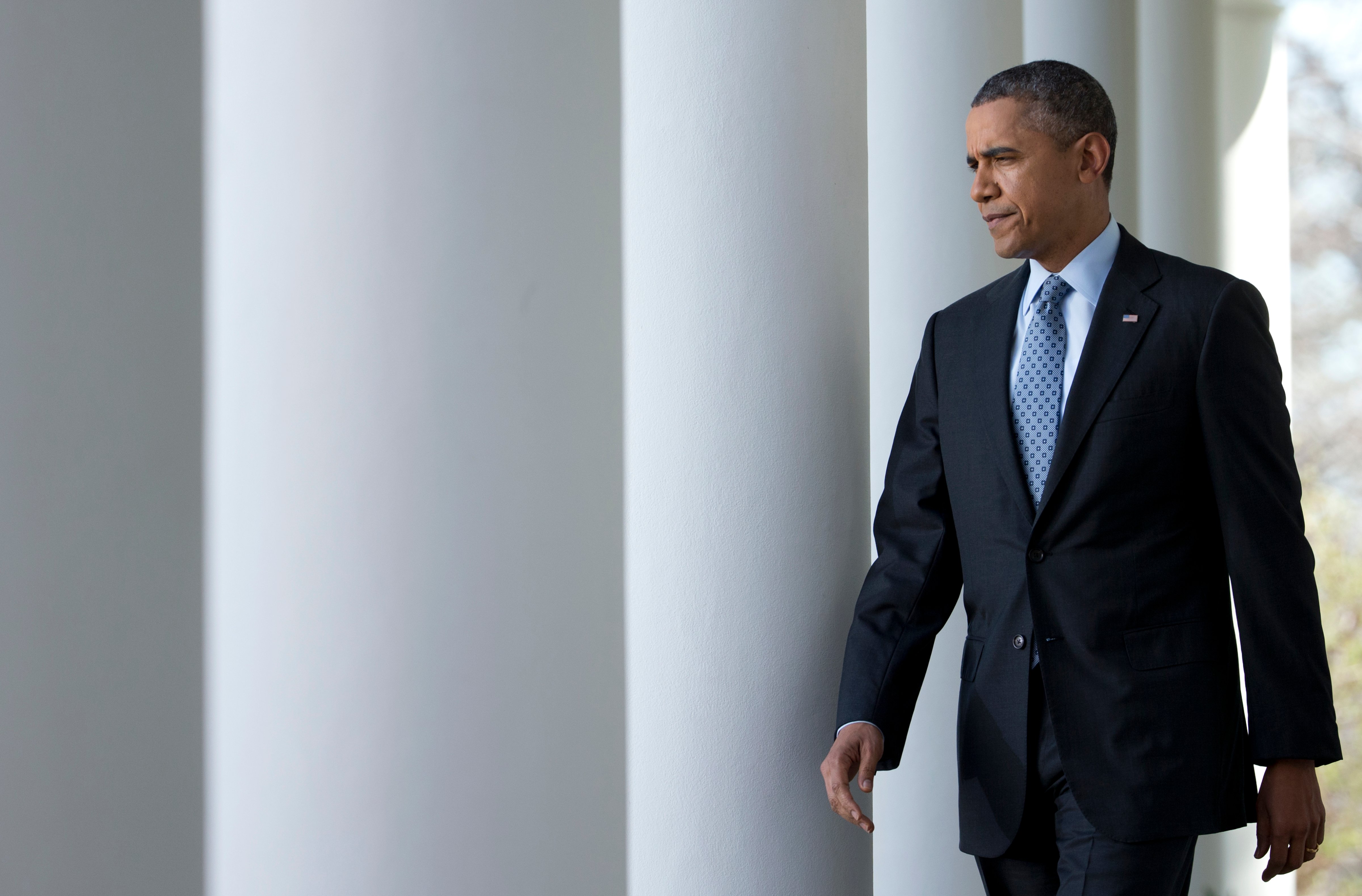 President Obama walks to the Rose Garden of the White House on April 1, 2014 (Manuel Balce Ceneta—AP)