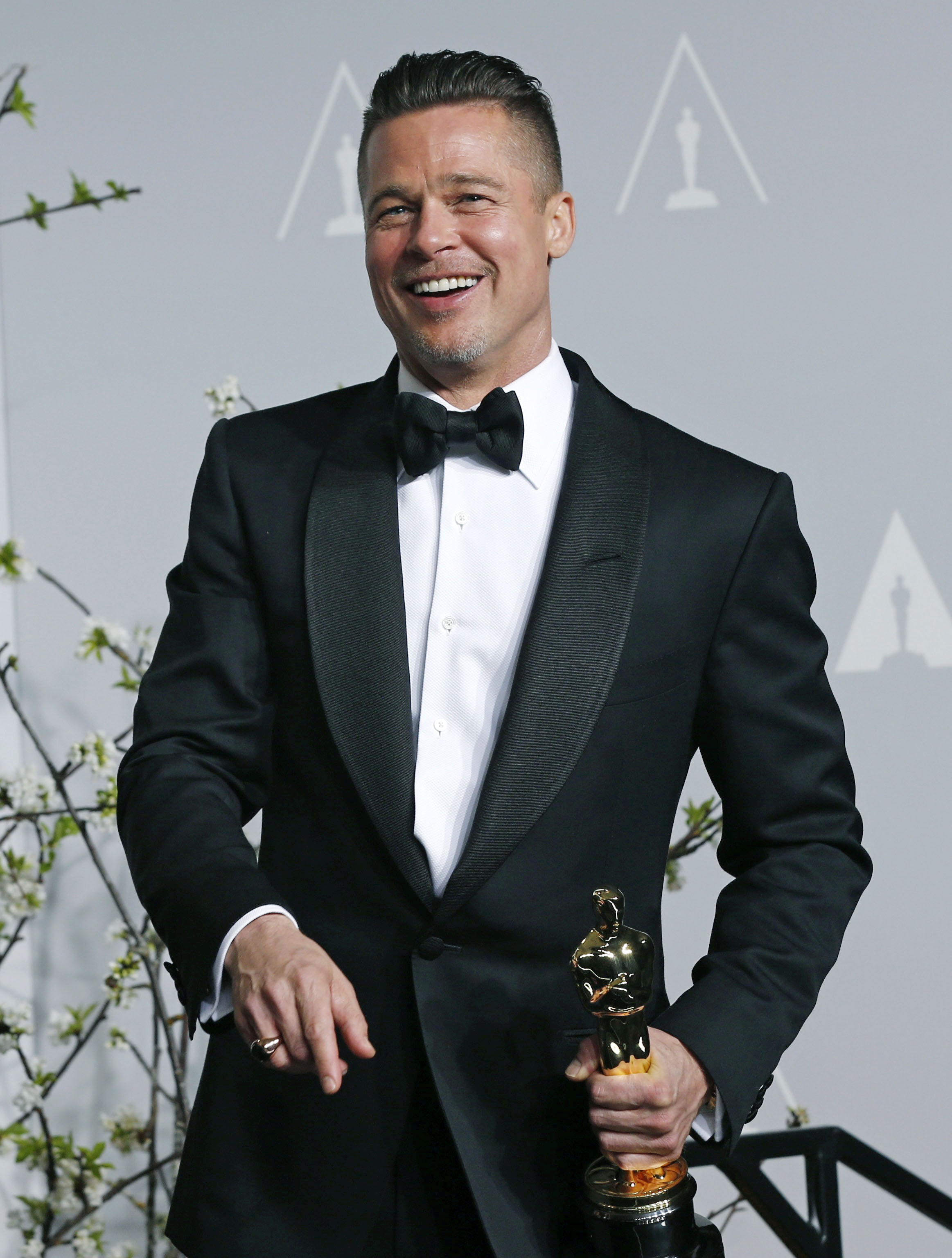 Brad Pitt at the 86th Academy Awards in Hollywood on March 2, 2014 after winning best picture for "12 Years a Slave".