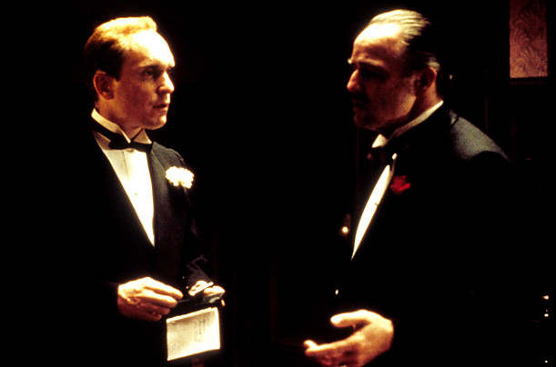 Robert Duvall and Marlon Brando in the opening scene of The Godfather, which Coppola directed under intense scrutiny from Paramount. For Brando, the role of Don Vito is perhaps his most iconic performance.