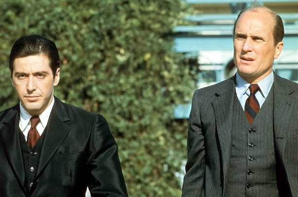 Pacino, as Michael Corleone, plays opposite Robert Duvall, his adopted brother Tom Hagen. The film was the first major motion picture to use  Part II  in the title, thus paving the way for the sequel as we know it today.
