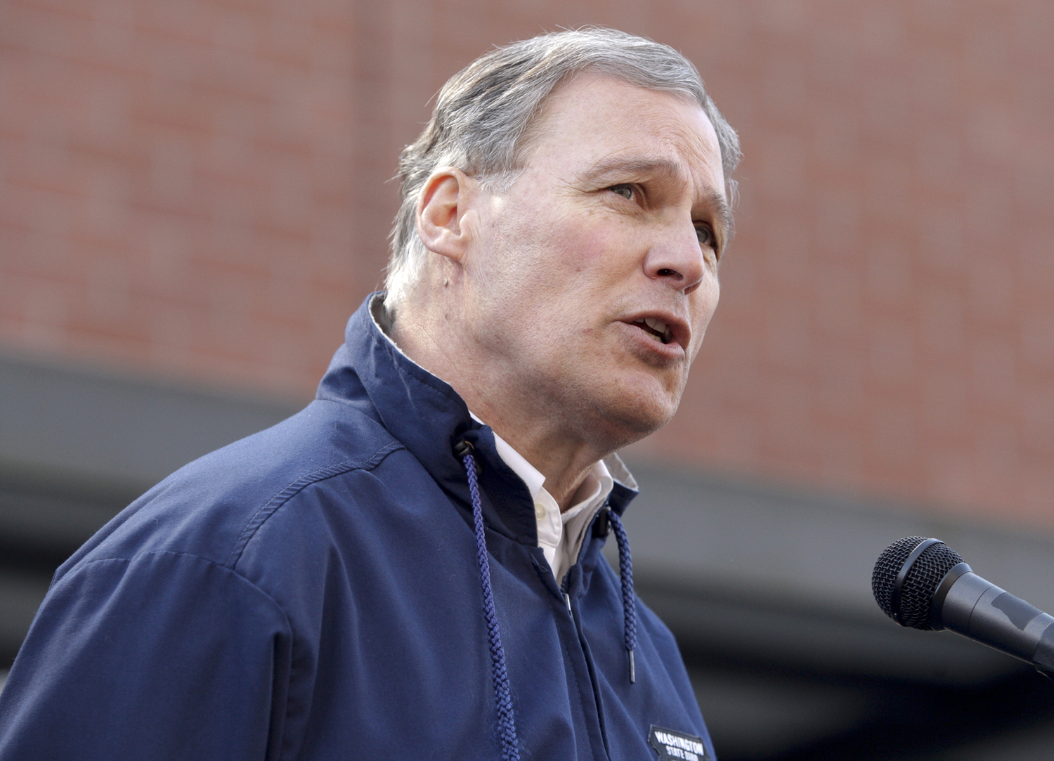 Washington Governor Jay Inslee wrote President Barack Obama on Tuesday to ask for more federal assistance for his disaster struck state. Jason Redmund—Reuters (Jason Redmund—Reuters)