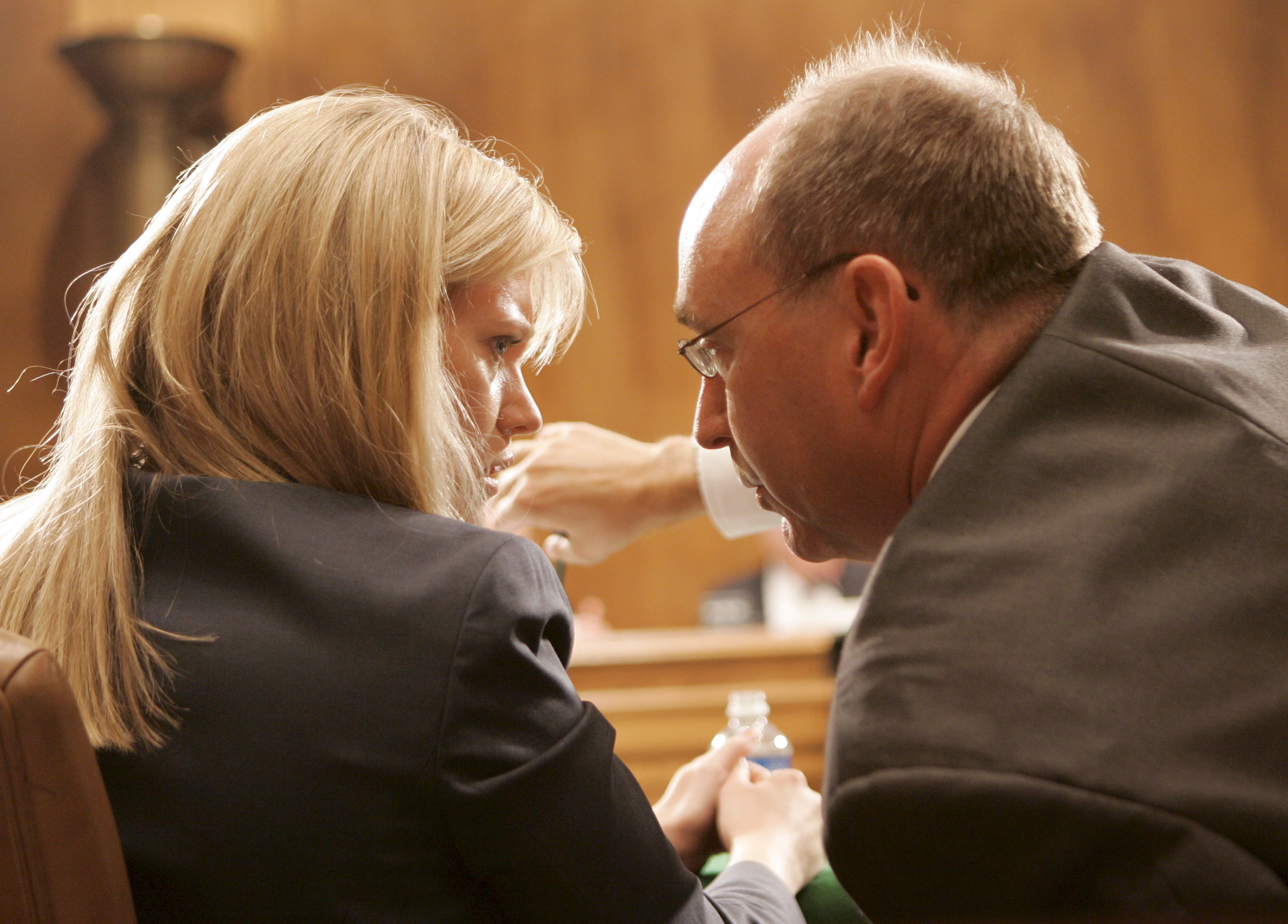 Former White House political director Sara Taylor (R) confers with her attorney Neil Eggleston (L) at a hearing of the US Senate Judiciary Committee on Capitol Hill in Washington, D.C. USA on 11 July 2007. (STEFAN ZAKLIN&mdash;EPA)