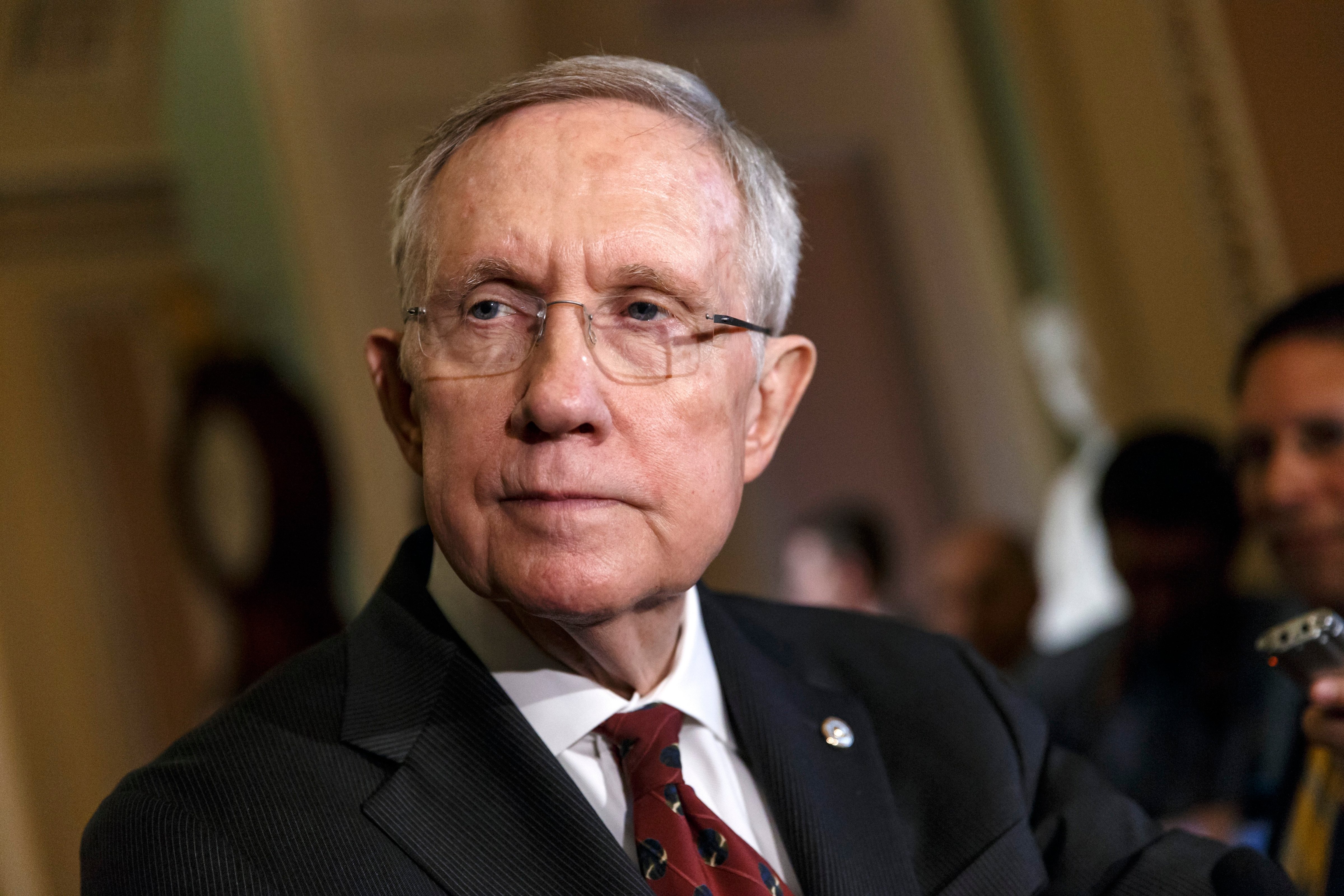 Senate Majority Leader Harry Reid talks to reporters as Congress returns from a two week recess, at the Capitol in Washington on April 29, 2014. (AP)