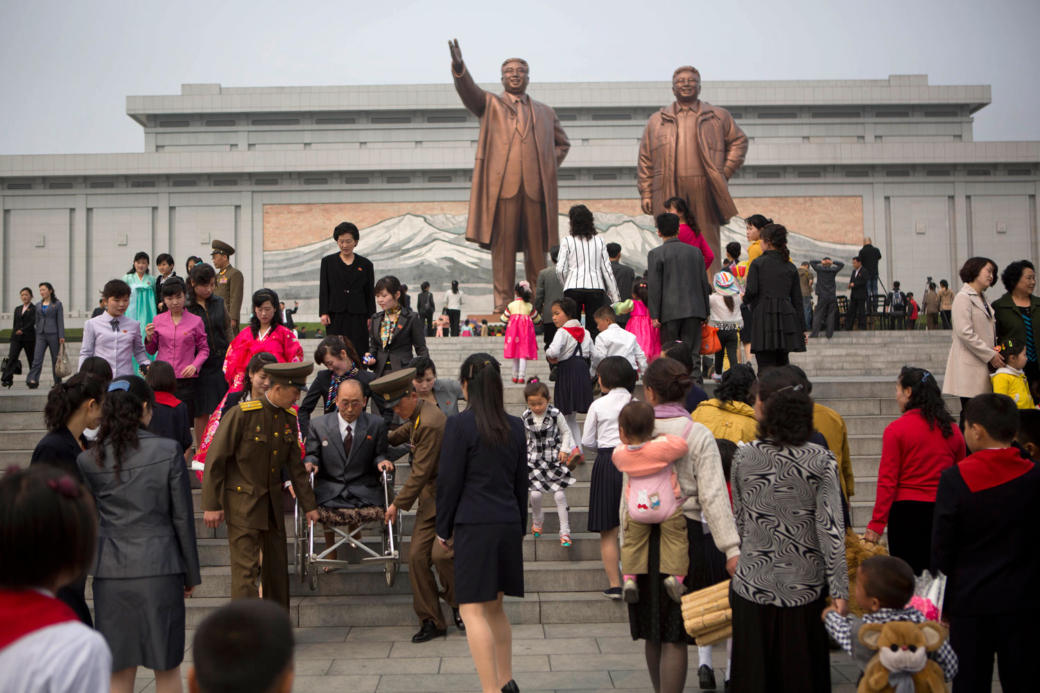 North Koreans arrive at Pyongyang's Mansu Hill