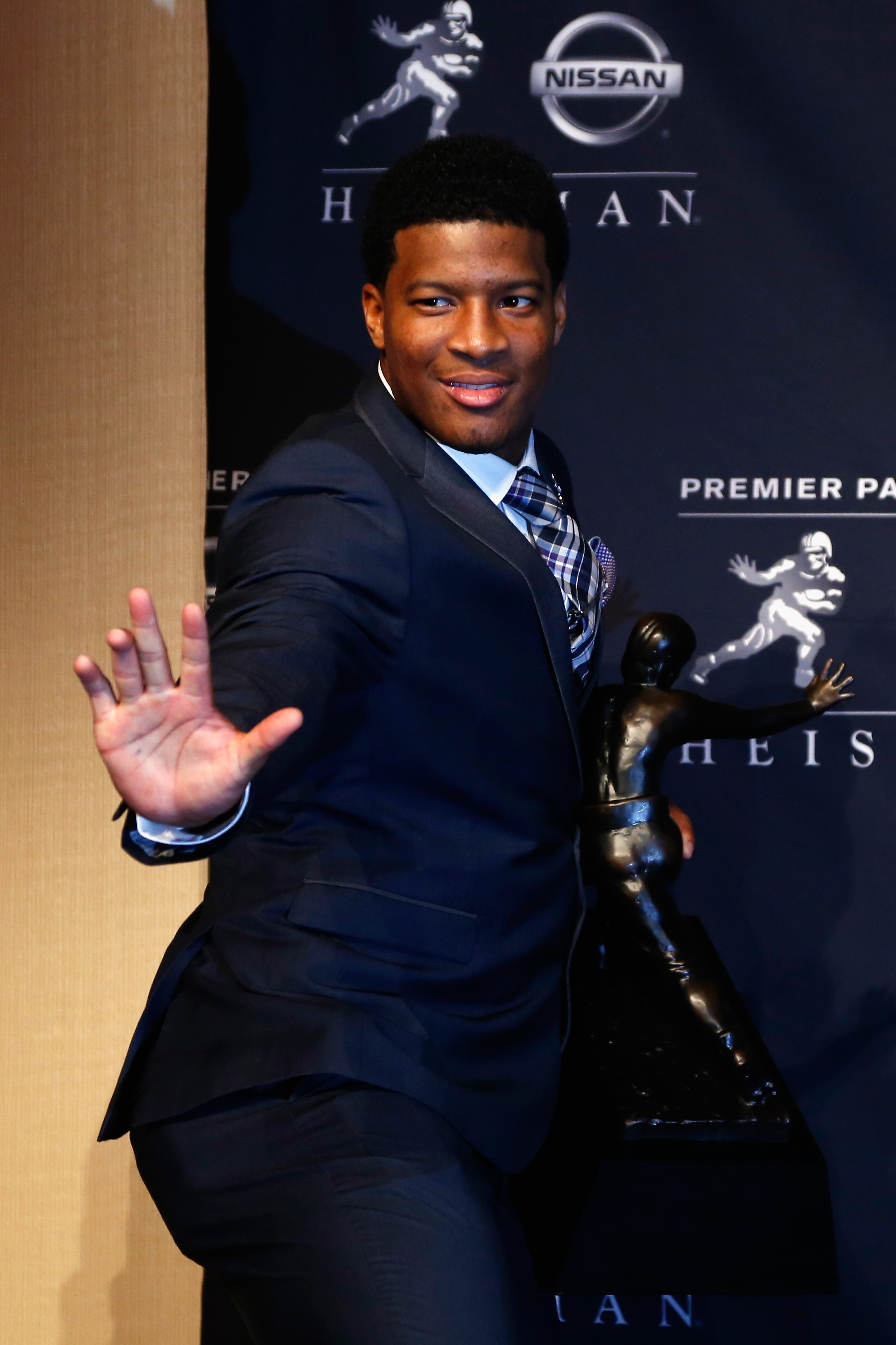 Jameis Winston, quarterback of the Florida State Seminoles, speaks to the media during a press conference after the 2013 Heisman Trophy Presentation at the Marriott Marquis on Dec. 14, 2013 in New York City. (Jeff Zelevansky—Getty Images)