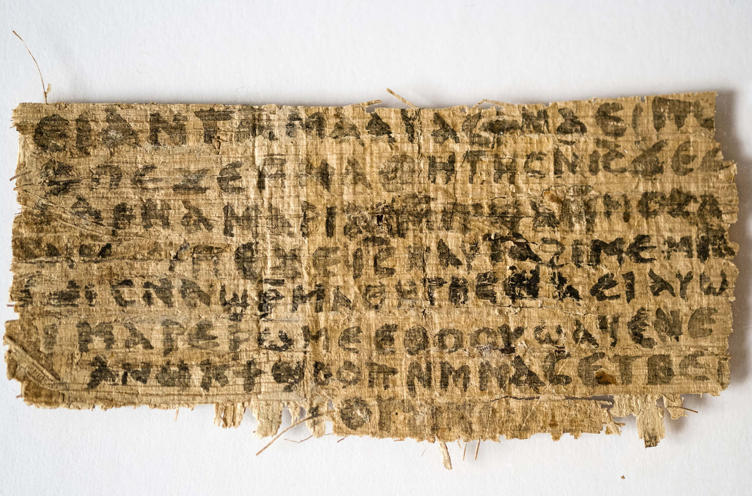 This Sept. 5, 2012 photo released by Harvard University shows a fourth century fragment of papyrus that divinity professor Karen L. King says is the only existing ancient text that quotes Jesus explicitly referring to having a wife. (Karen L. King—Harvard University/AP)