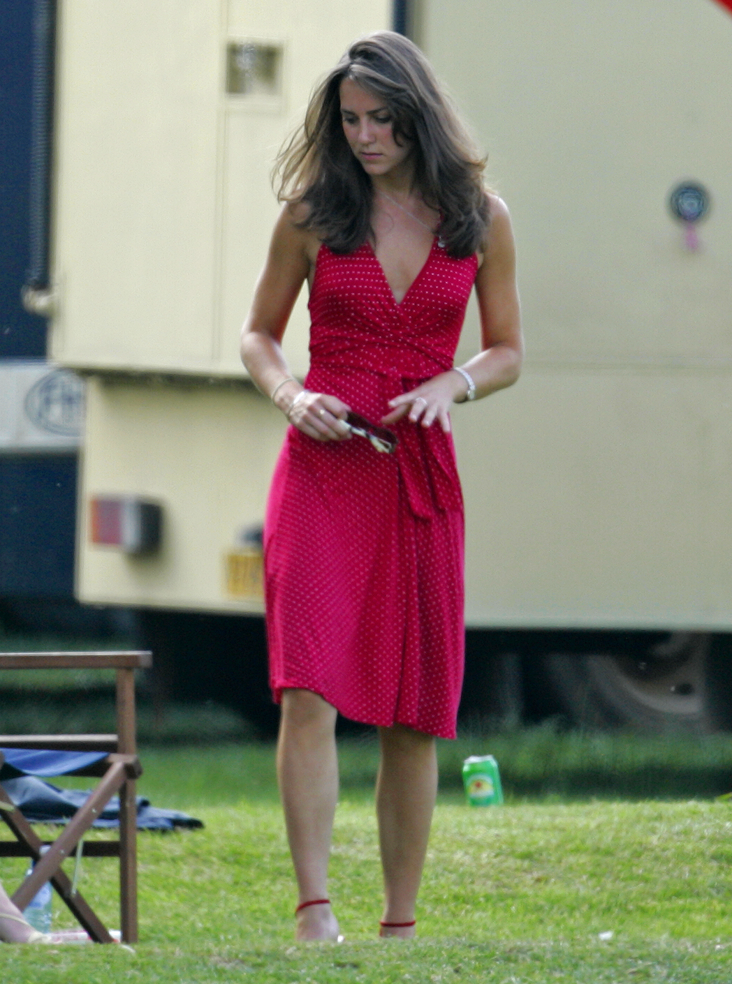 Showing Some Skin
                              Middleton wore a sleeveless polka-dot dress to cheer on Prince William at the Chakravarty Cup charity polo match on June 17, 2006.