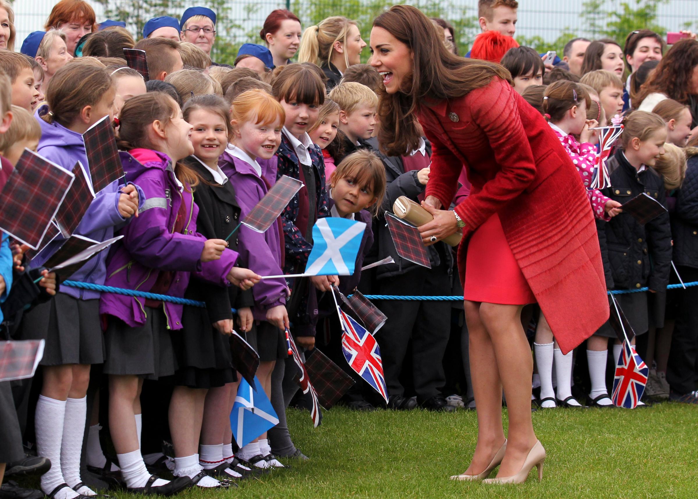 Britain's Catherine, the Duchess of Cambridge, meets pupils and community members during a visit to the Strathearn Community Campus at Crieff in Scotland