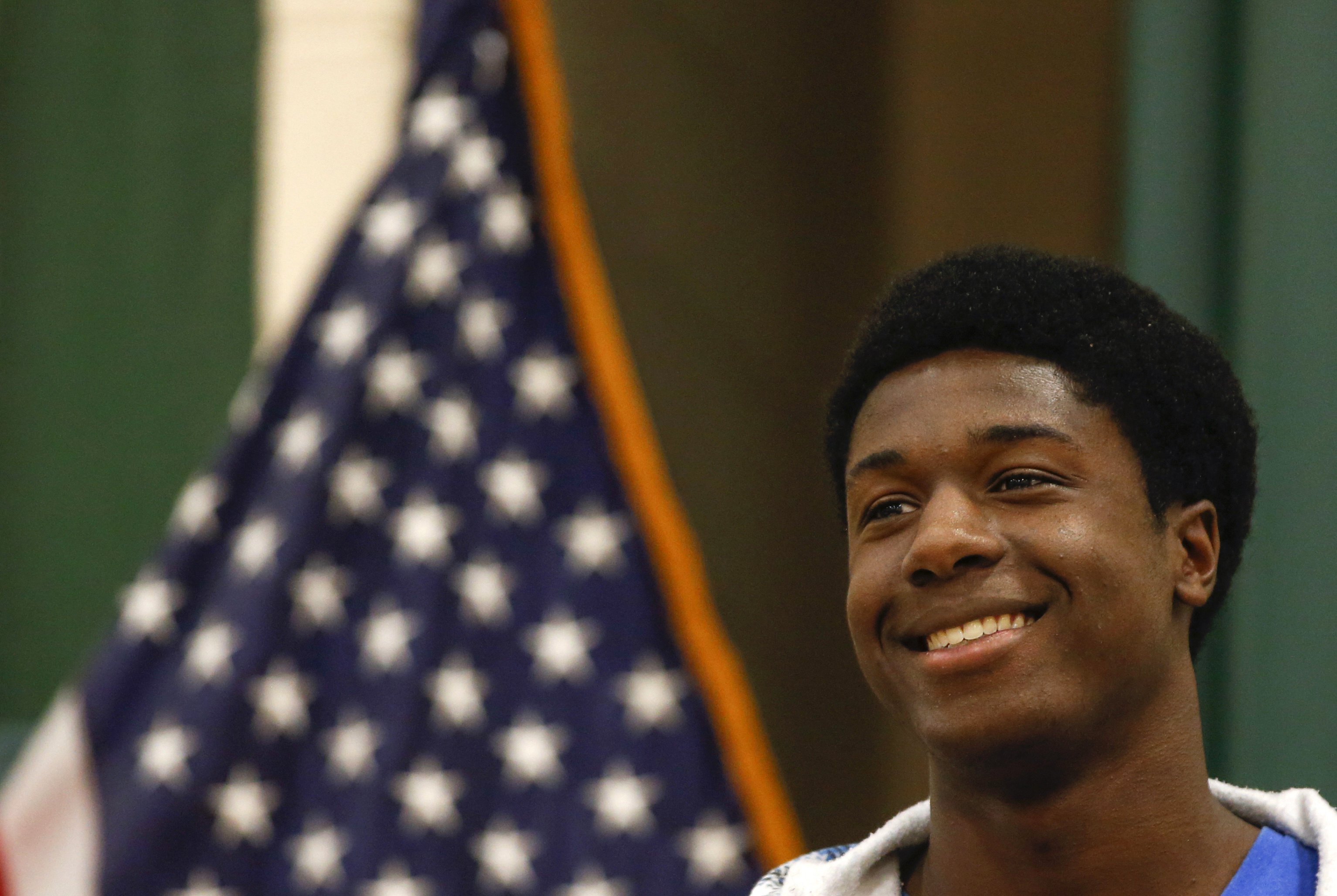 Kwasi Enin, a high school senior, smiles after announcing he will attend Yale University during a press conference at William Floyd High School in Mastic Beach, New York on April 30, 2014. (Shannon Stapleton—Reuters)