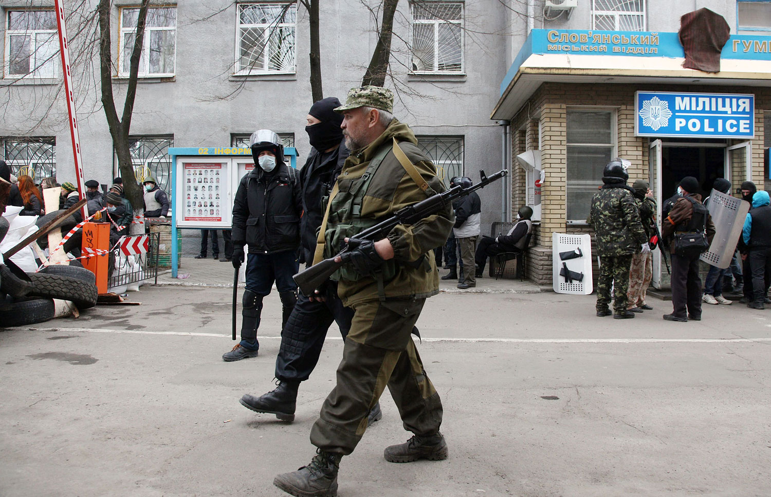 Armed pro-Russian activists guard a police station in the eastern Ukrainian city of Slavyansk after it was seized by a few dozen gunmen on April 12, 2014. (Anatoliy Stepanov—AFP/Getty Images)
