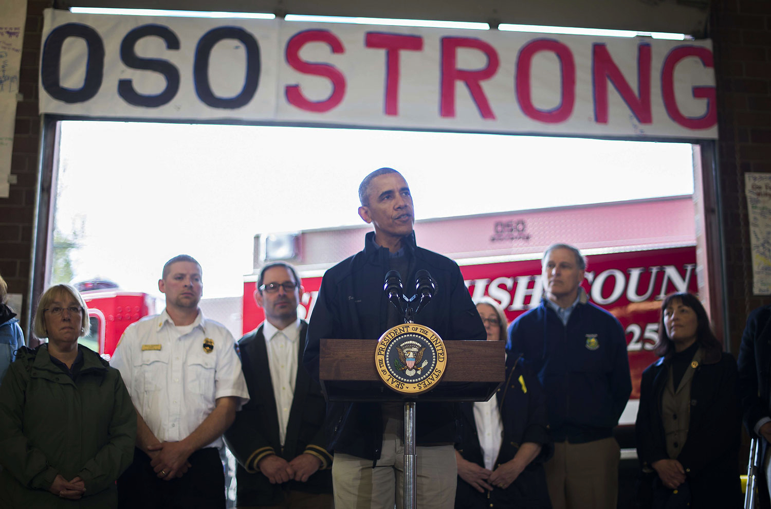 US President Barack Obama delivers remarks at the firehouse in Oso, Washington, April 22, 2014, after touring the devastation left by a recent landslide.