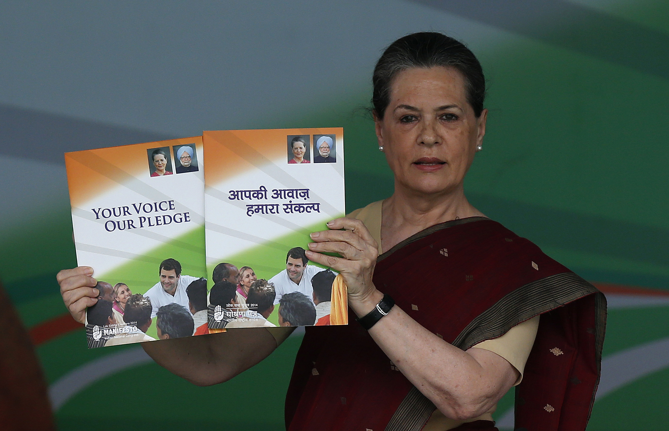 Gandhi Chief of India's ruling Congress party holds her party's election manifesto in New Delhi