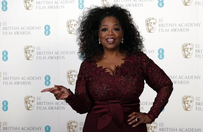 Citation reader Winfrey poses in the Winner's Area at the BAFTA awards ceremony at the Royal Opera House in London