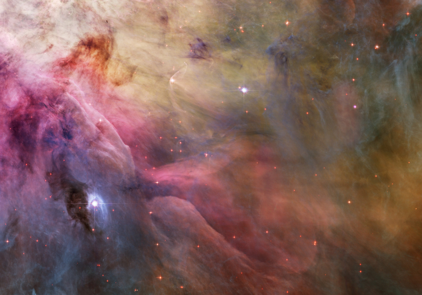 This close-up of cosmic clouds and stellar winds features LL Orionis, interacting with the Orion Nebula flow. Adrift in Orion's stellar nursery and still in its formative years, variable star LL Orionis produces a wind more energetic than the wind from our own middle-aged Sun.