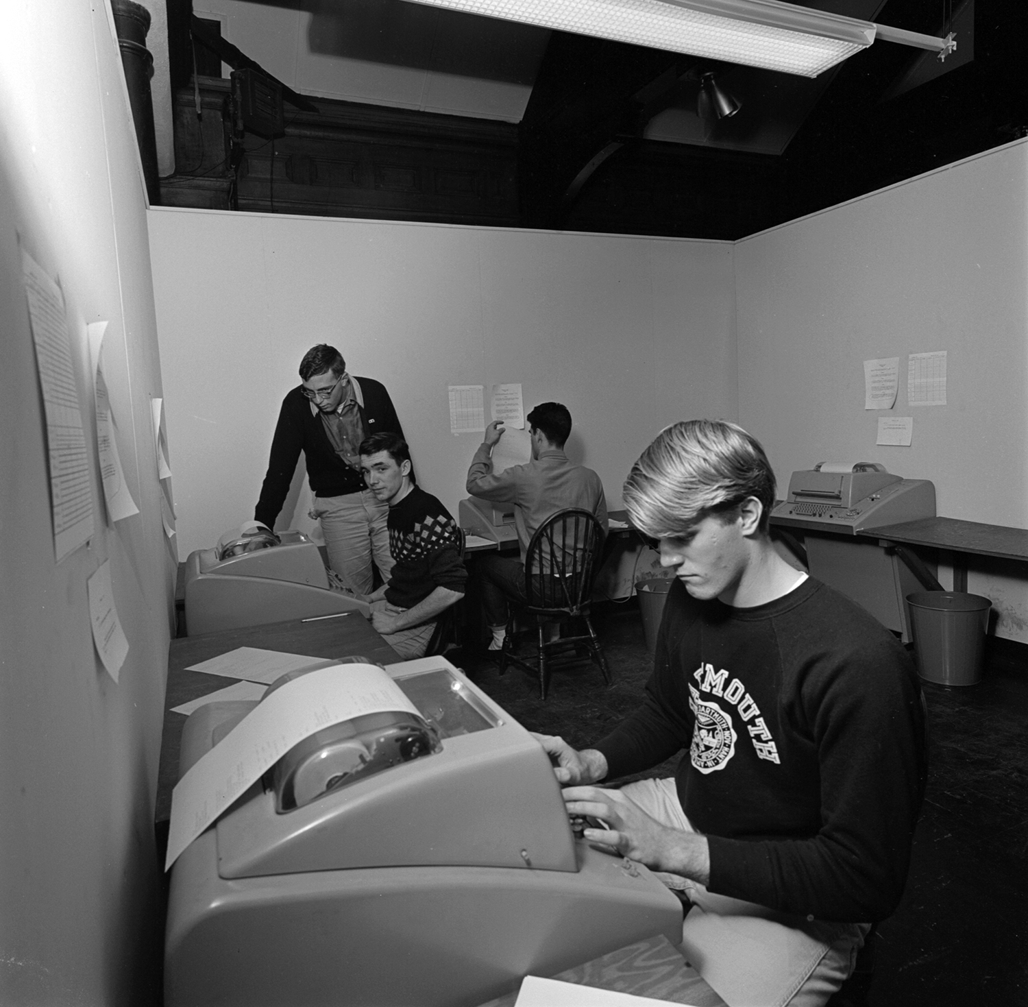 Dartmouth students at work in a remote computer center in 1965 (Adrian N. Bouchard / Dartmouth College)