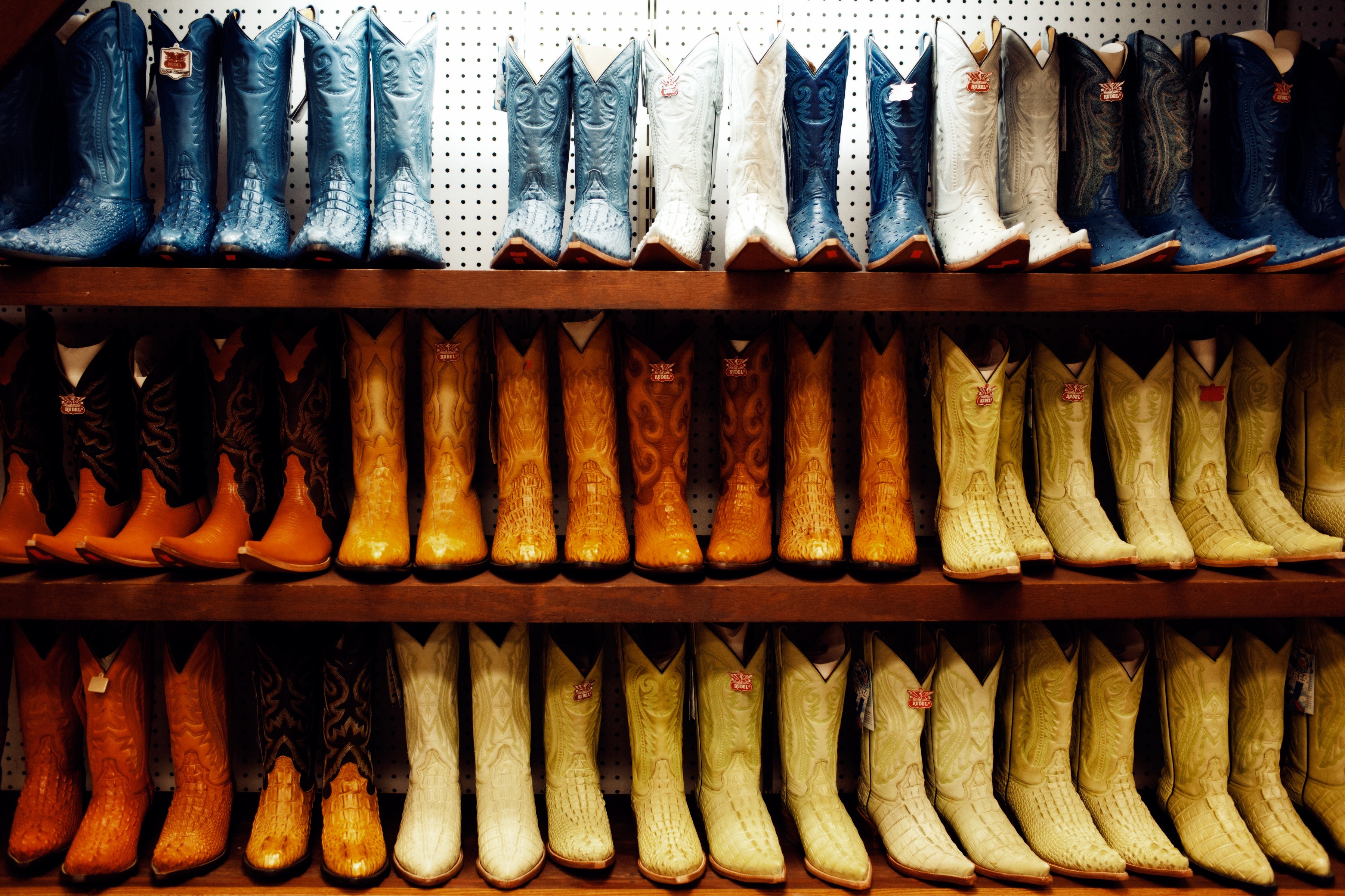 Cowboy boots in a rainbow of color for sale at José de Jésus Legaspi's La Gran Plaza. (Ross McDonnell for TIME)