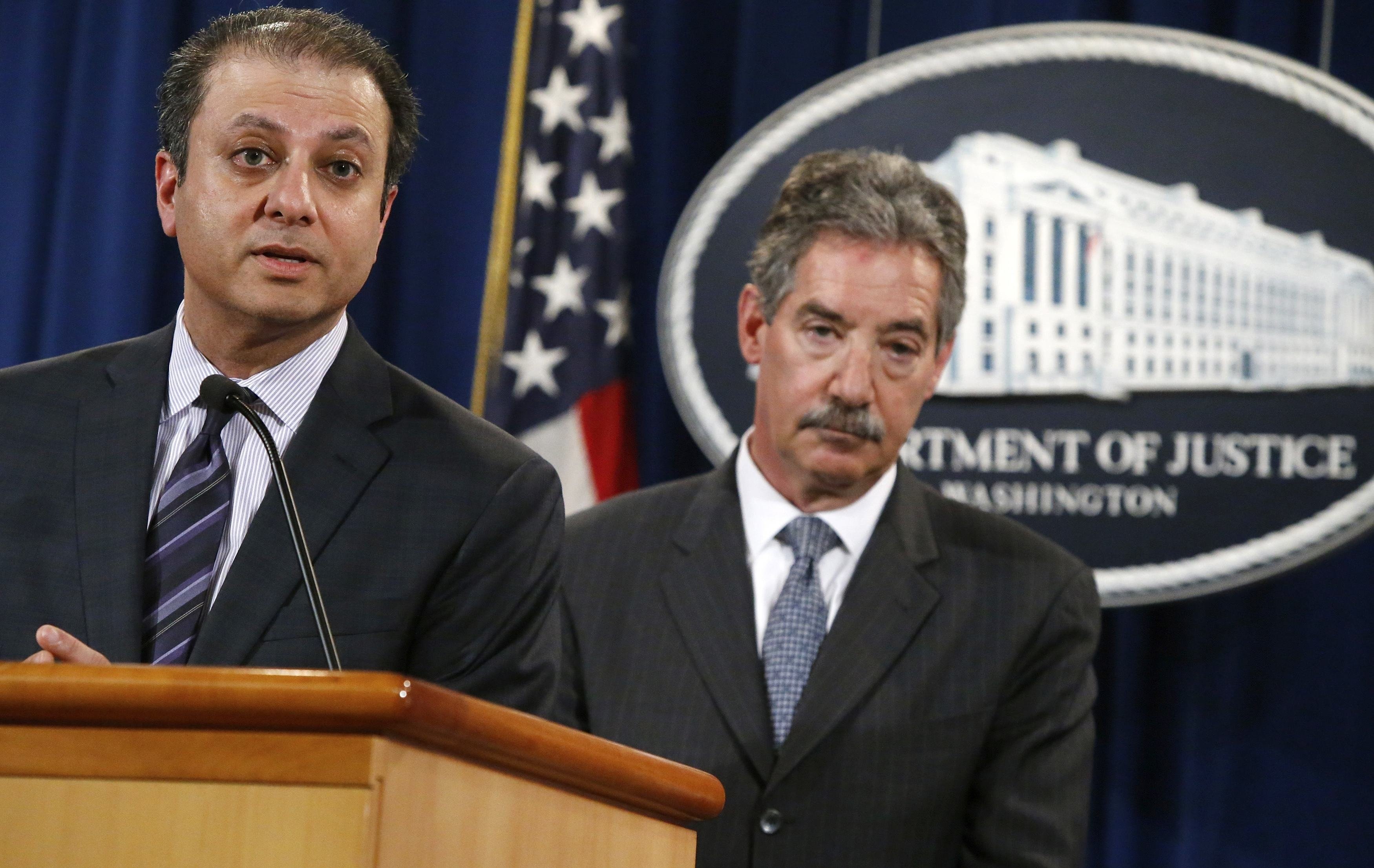 U.S. Attorney for the Southern District of New York Preet Bharara speaks while flanked by U.S. Deputy Attorney General James Cole as they announce a settlement with Anadarko Petroleum Corp at the Justice Department in Washington, April 3, 2014. (Jonathan Ernst—Reuters)
