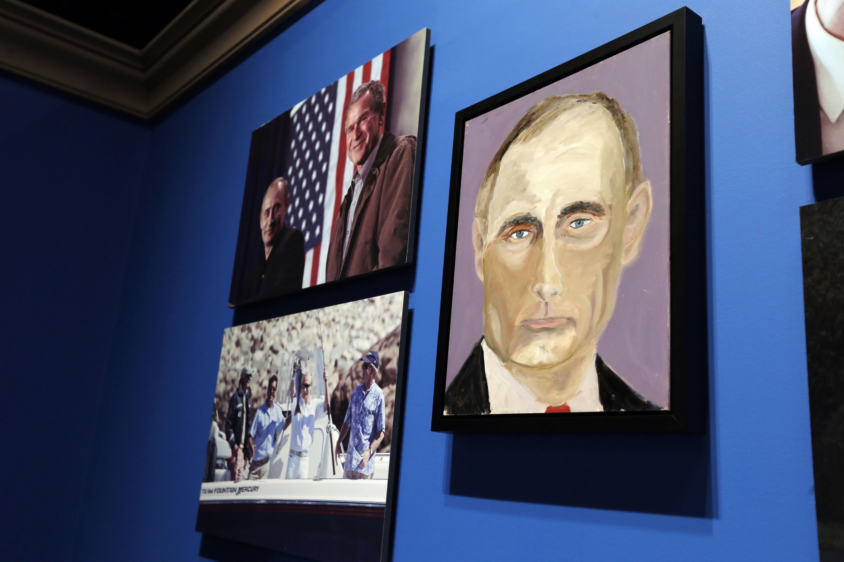 A portrait of Russian President Vladimir Putin, painted by former U.S. President George W. Bush, is displayed at "The Art of Leadership: A President's Personal Diplomacy" exhibit at the Bush Presidential Library and Museum in Dallas, April 4, 2014. (Brandon Wade—Reuters)