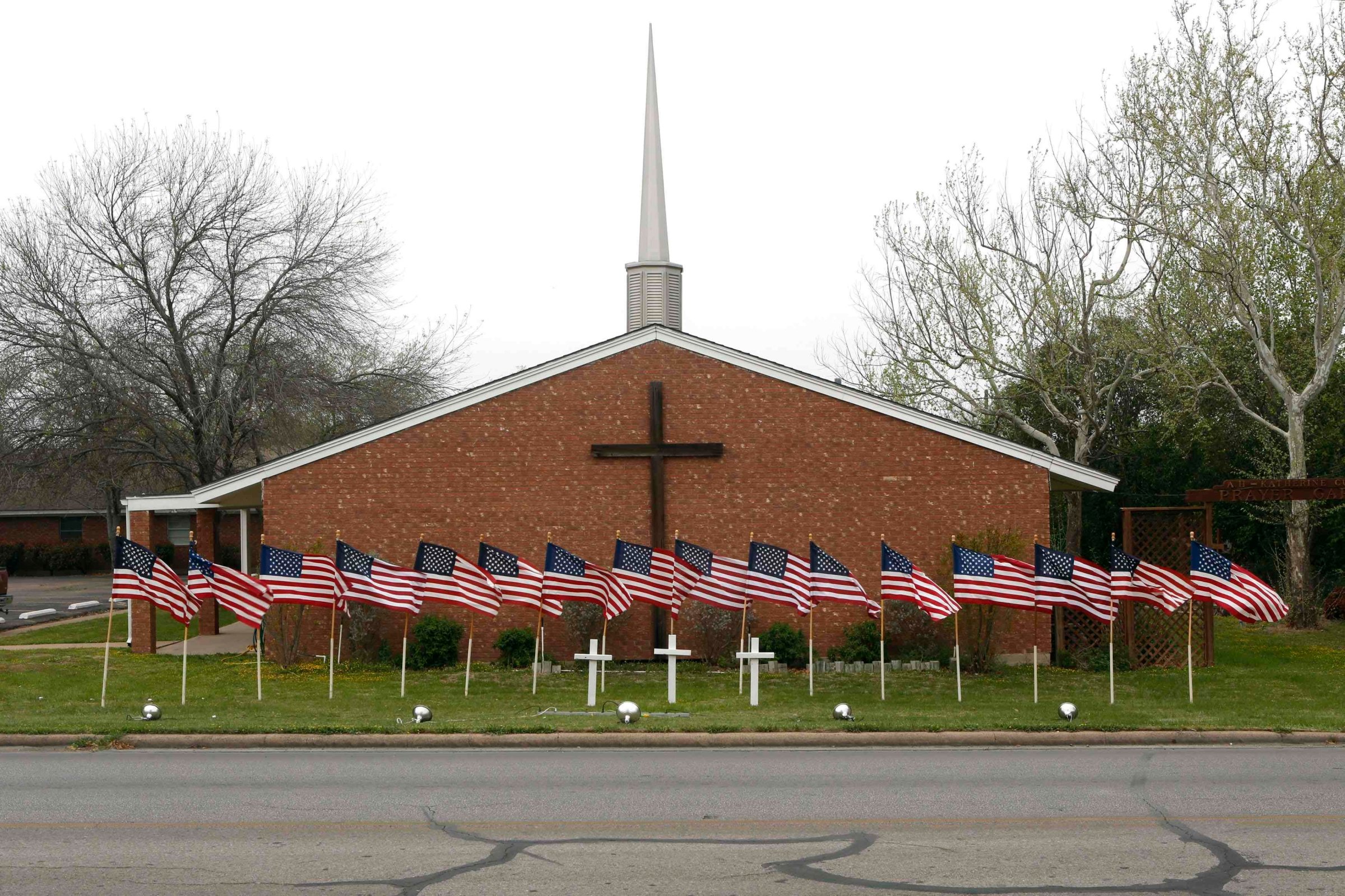 U.S. flags are pictured in front of the Central Christian Church in Killeen, Texas