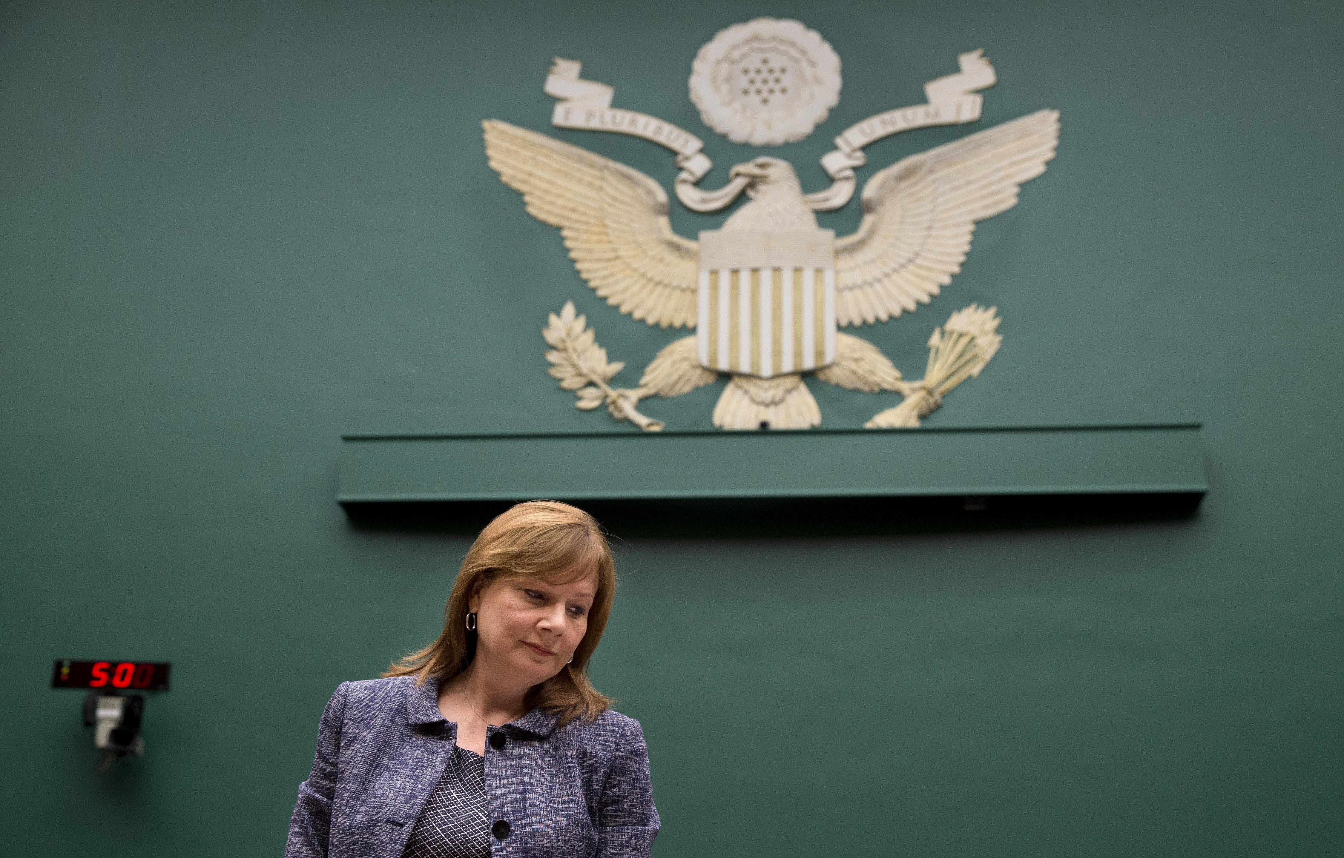 GM CEO Mary Barra takes her seat on Capitol Hill in Washington on April 1, 2014, prior to testifying before the House Energy and Commerce Subcommittee on Oversight and Investigations (Evan Vucci—AP)