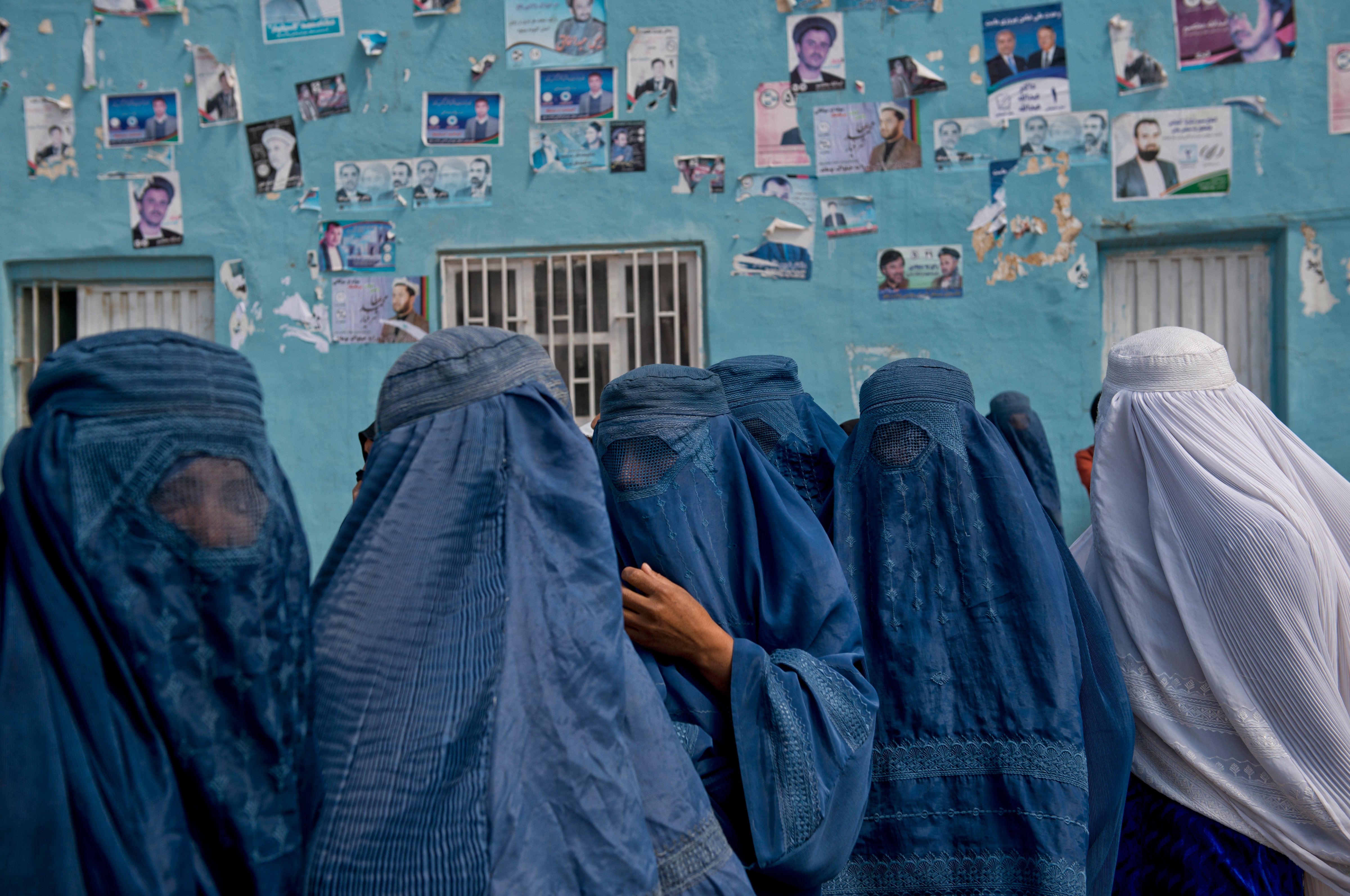 <strong>Election Fever</strong> Women leave a political rally held in a stadium in Mazar-i-Sharif in the country’s north. (Lynsey Addario for TIME)