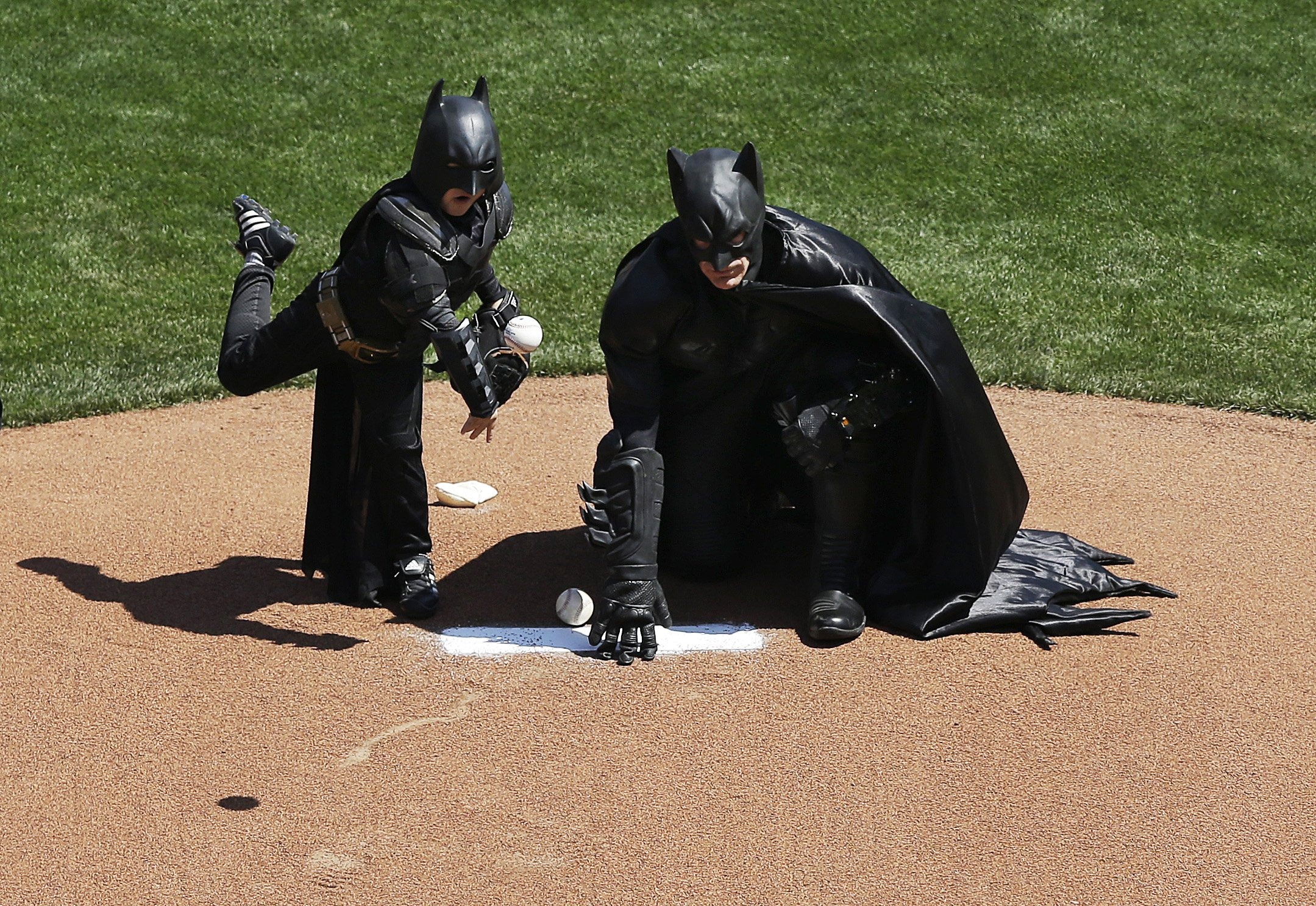 Batkid throws the opening pitch for the San Francisco Giants