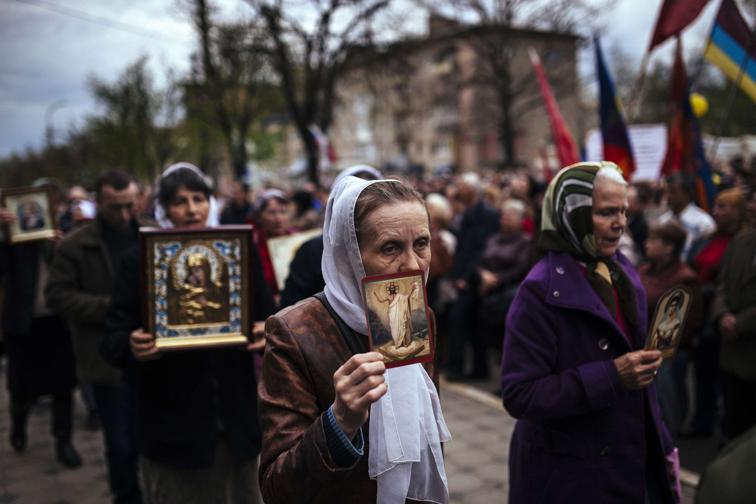 Apr. 21, 2014.
                              Women carry Orthodox icons during a pro-Russian rally outside the secret service building in the eastern Ukrainian city of Lugansk.