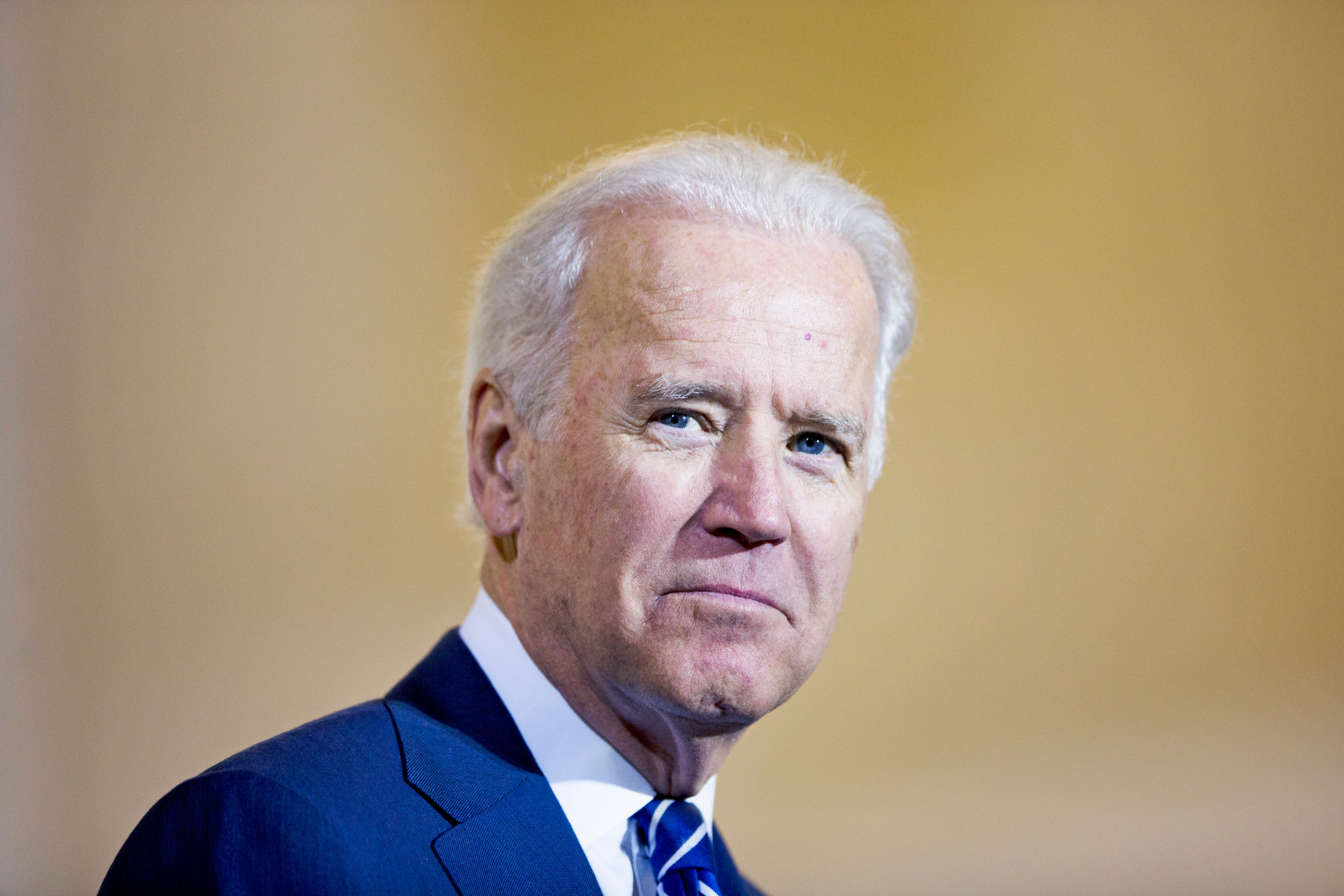 Vice President Joe Biden listens to remarks at a news conference on Feb. 6, 2014, at 30th Street Station in Philadelphia. (Matt Rourke—AP)