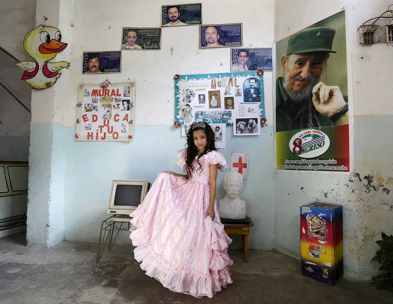 Apr. 4, 2014. Fifth grade student at the Enrique Villuendas Primary School, Erika Kina, 10, poses in her princess costume as her school celebrates the 52nd anniversary of the Young Communist League (UJC) and the 53rd anniversary of the Jose Marti Pioneers Organization (OPJM) in Havana, Cuba.