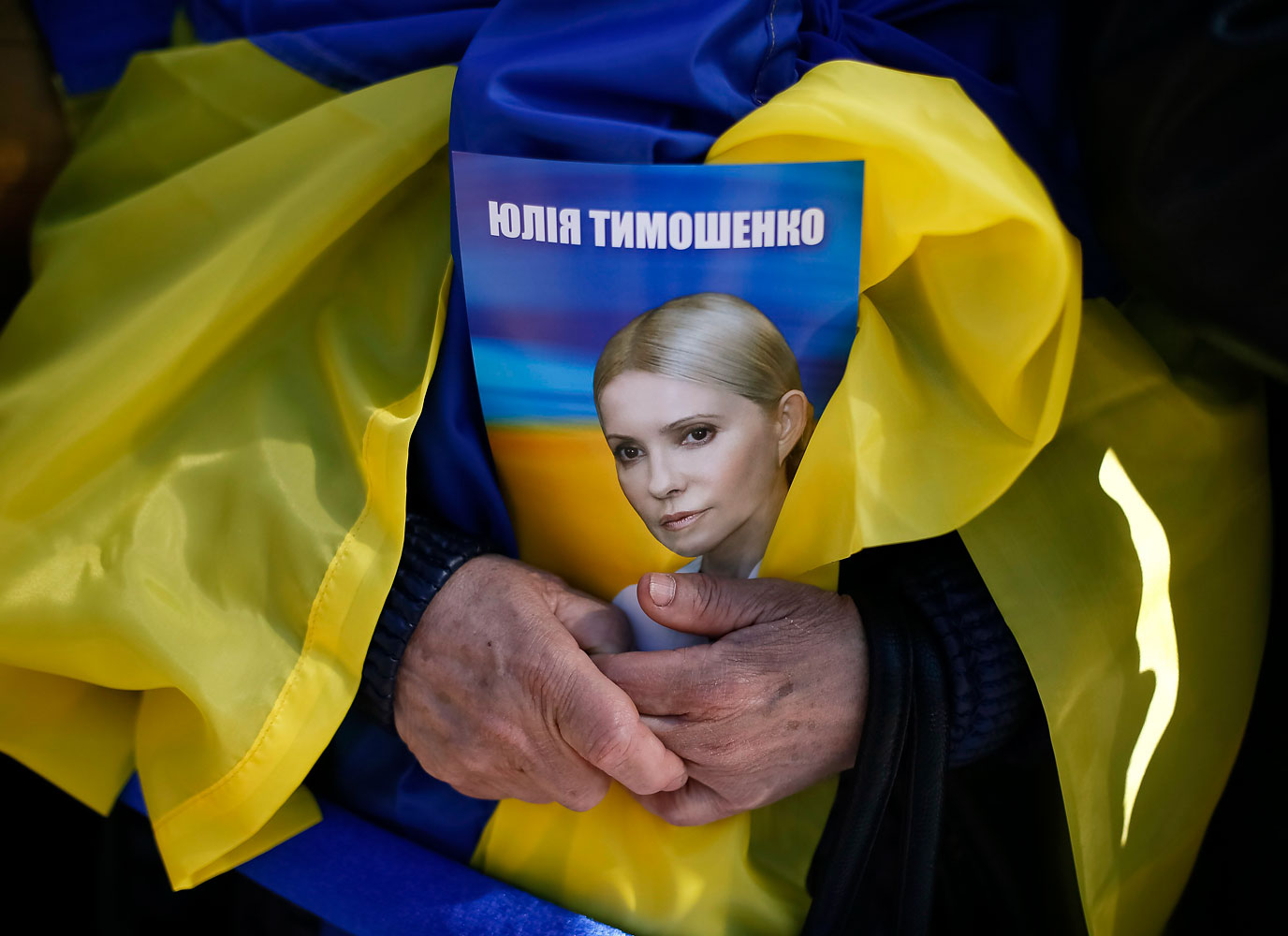 A supporter of Ukrainian politician and former prime minister Yulia Tymoshenko in central Kiev, March 29, 2014. If she is elected President, Tymoshenko has pledged to fight corruption, as have most of the candidates who have put forward a platform for the vote.